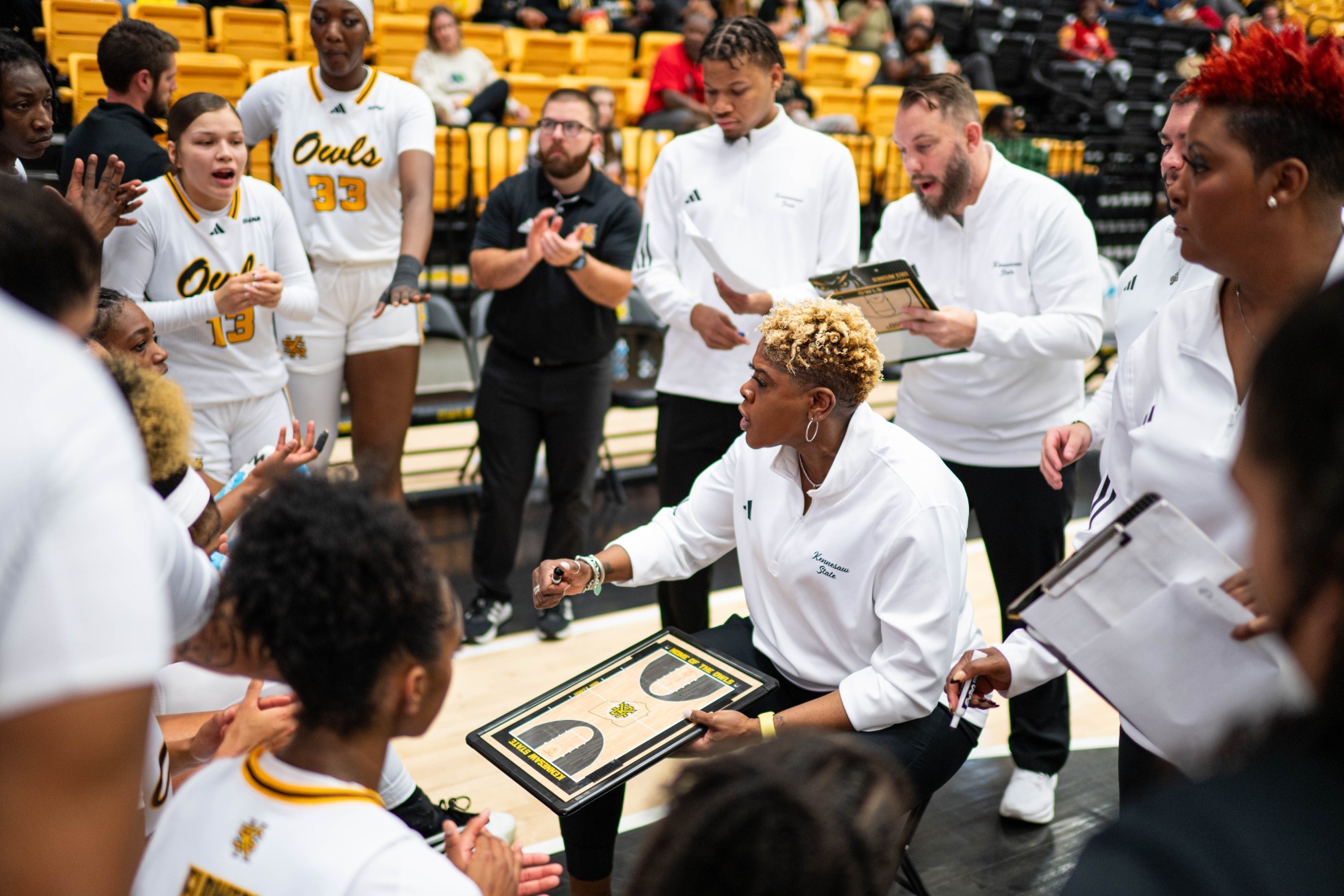 Kennesaw State head women's basketball coach Octavia Blue huddles with her team in a game versus Florida Atlantic on November 8, 2025.