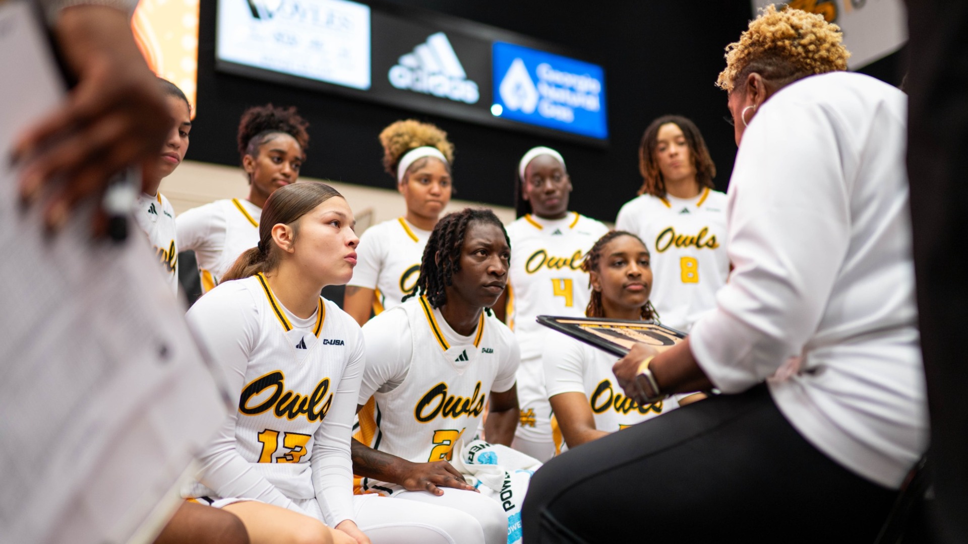 Kennesaw State women's basketball players huddle during a 69-68 loss to Florida Atlantic in November 2025.
