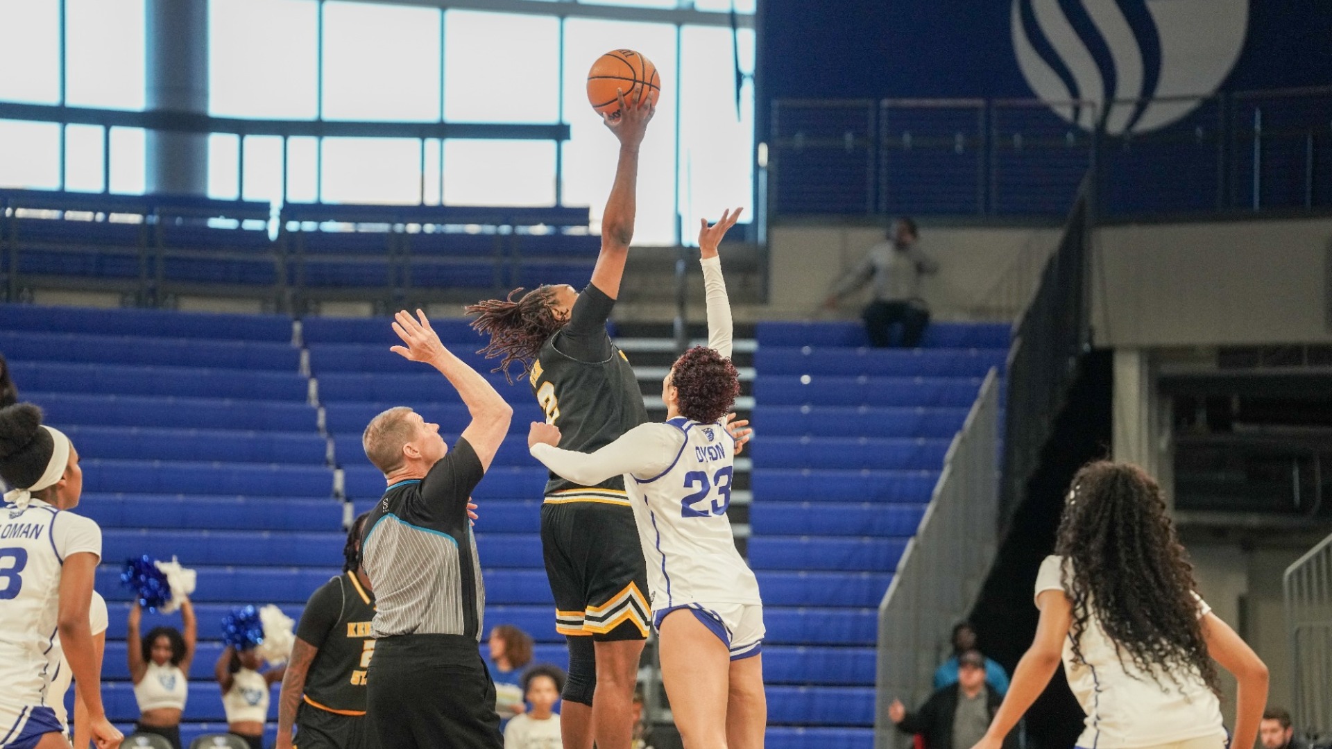 Kennesaw State women's basketball's Trynce Taylor jumps at tip off in a December 16, 2026 game at Georgia State.
