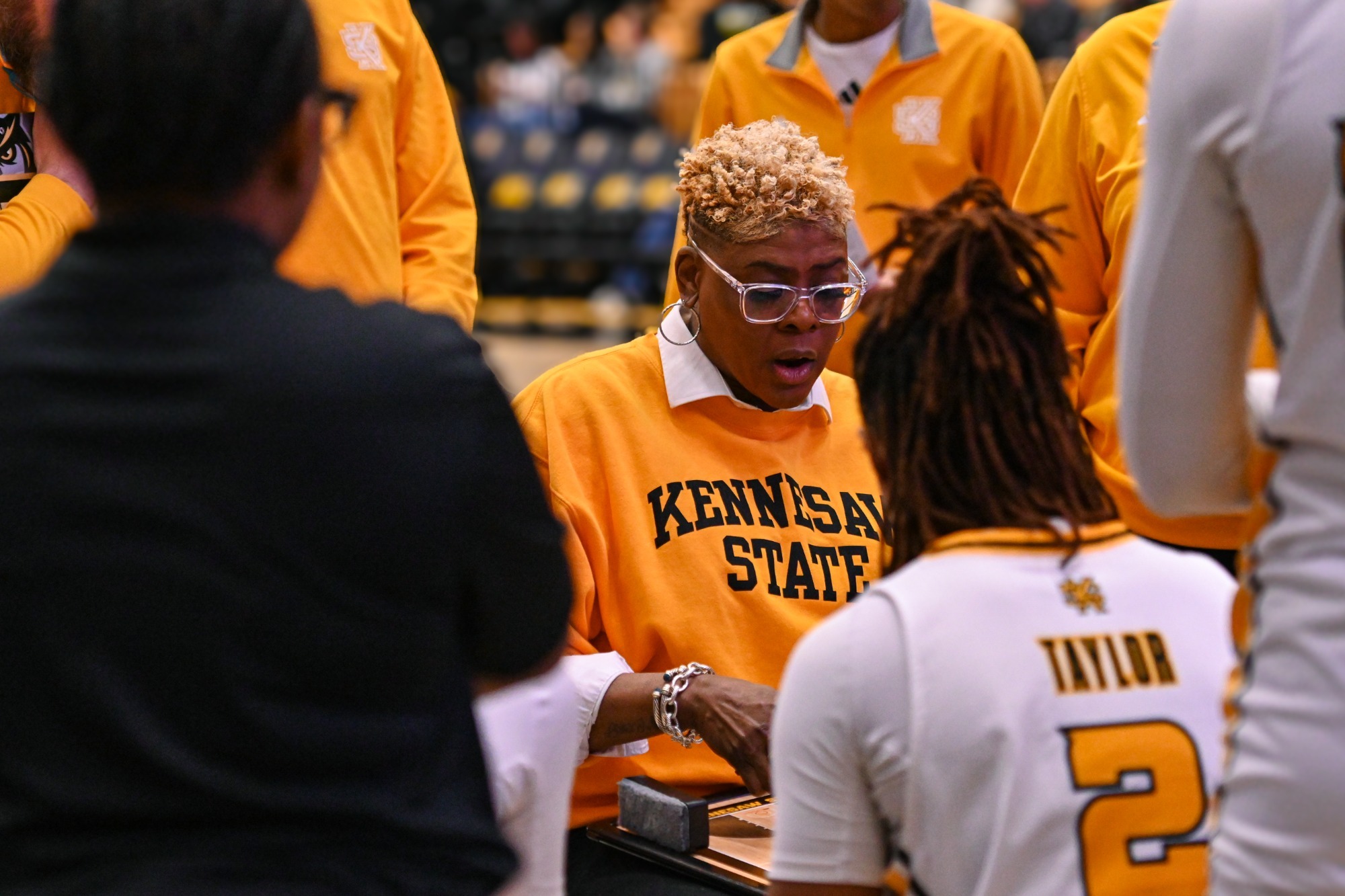 Kennesaw State women's basketball head coach Octavia Blue in the huddle.