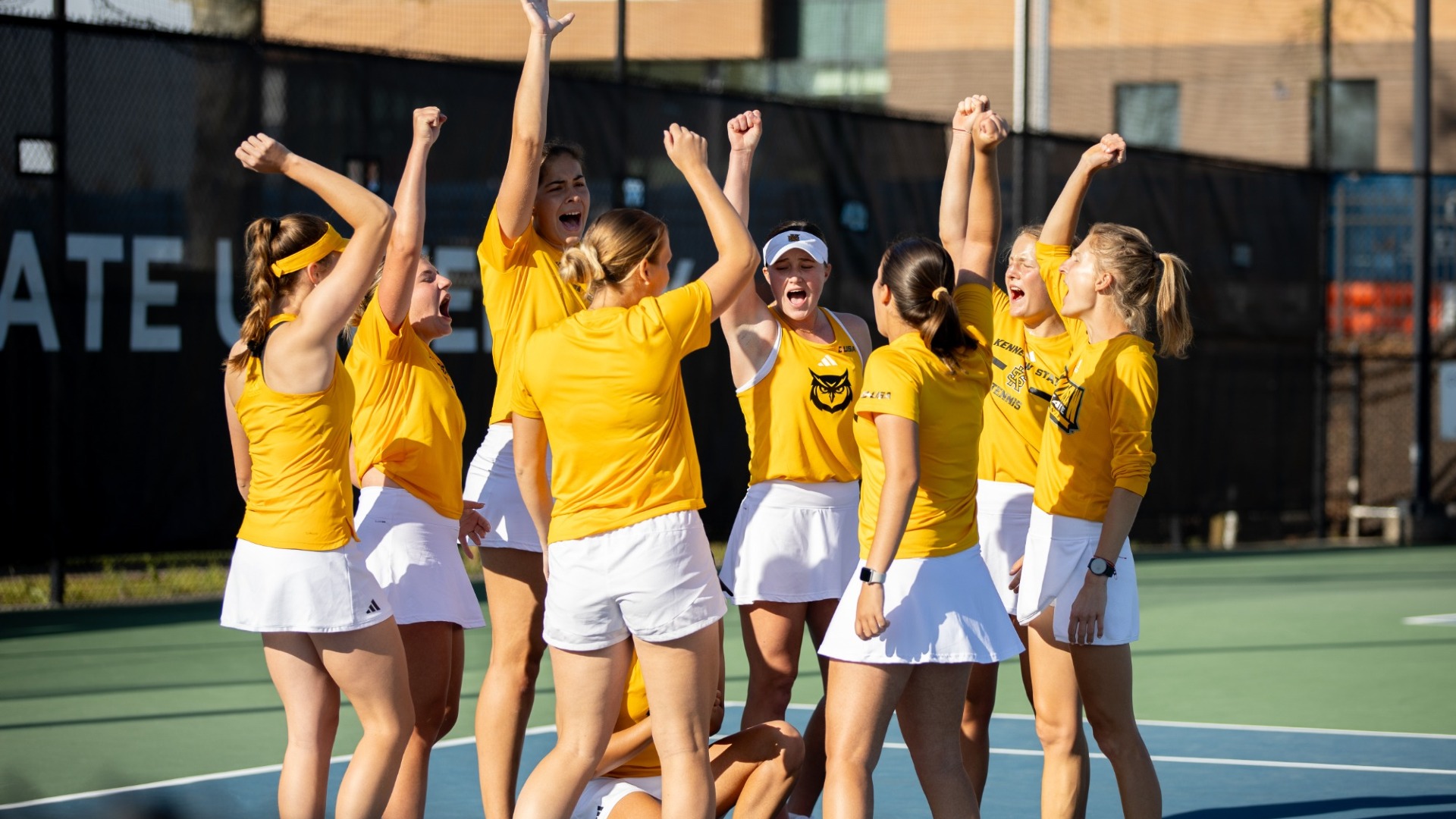Kennesaw State women's tennis huddles before a match.