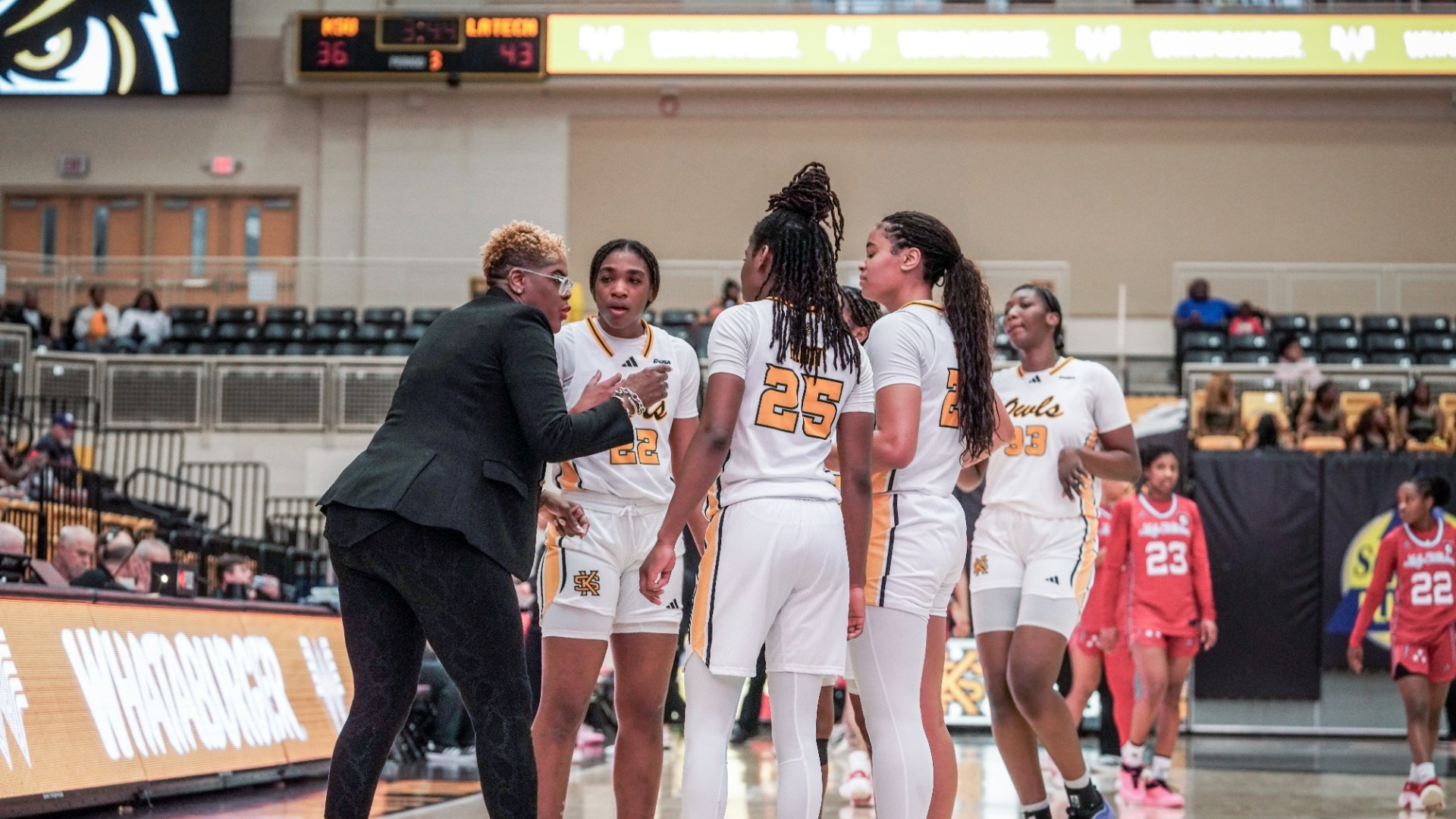 Kennesaw State women's basketball huddles