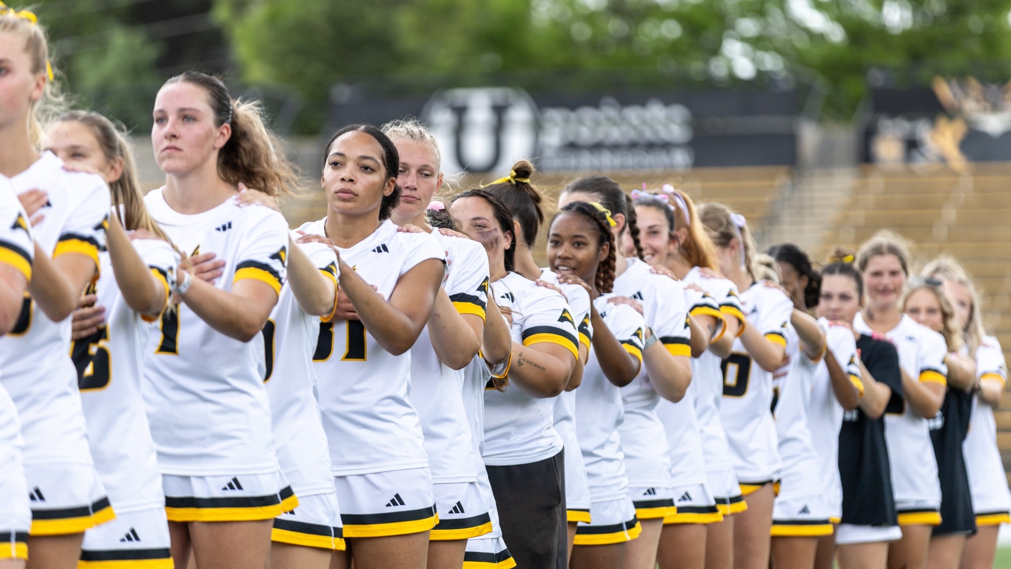 LAX Team stands for national anthem