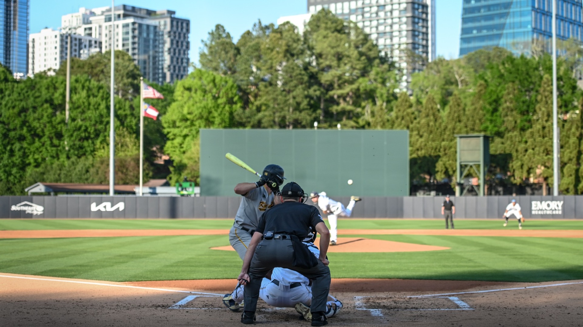 James McGee batting with Midtown skyline in the backgroun