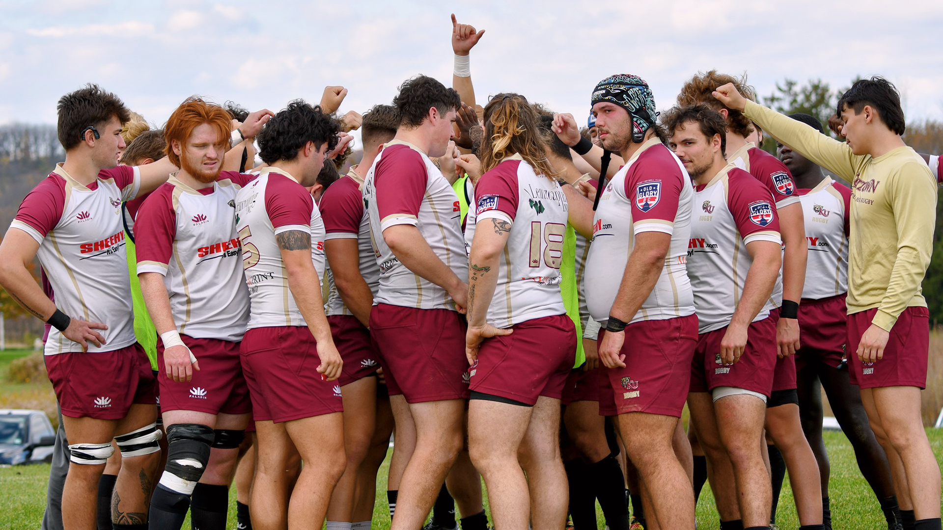 Kutztown men's rugby in a team huddle, 10/30/23