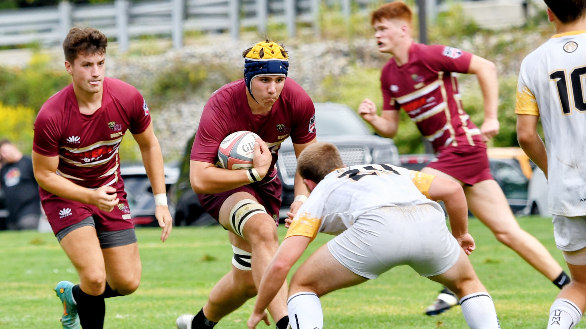 Men's Rugby running with the ball vs. Adrian, 9/9/23