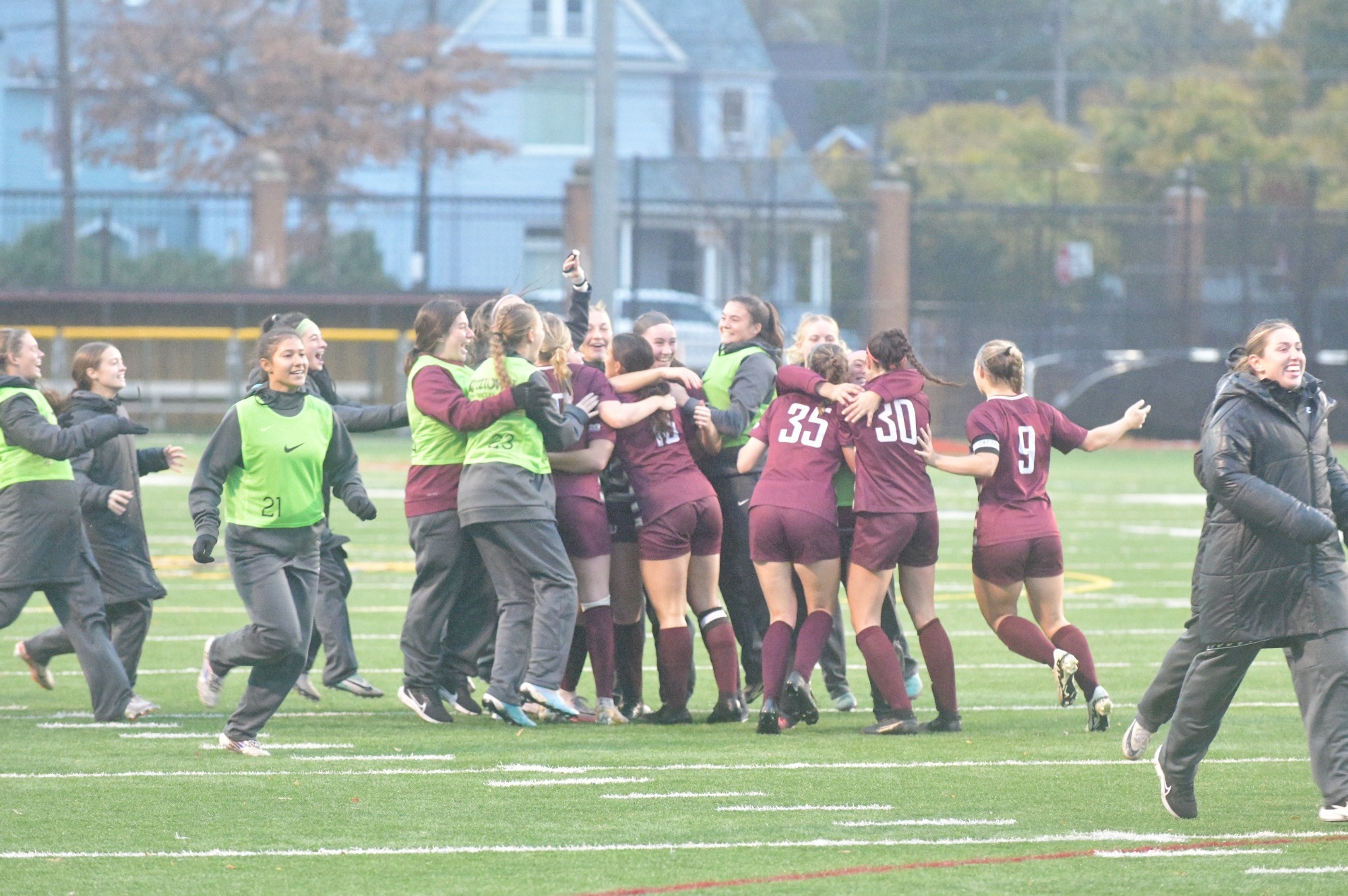 KU WSOC celebrating PSAC semifinal win vs Gannon