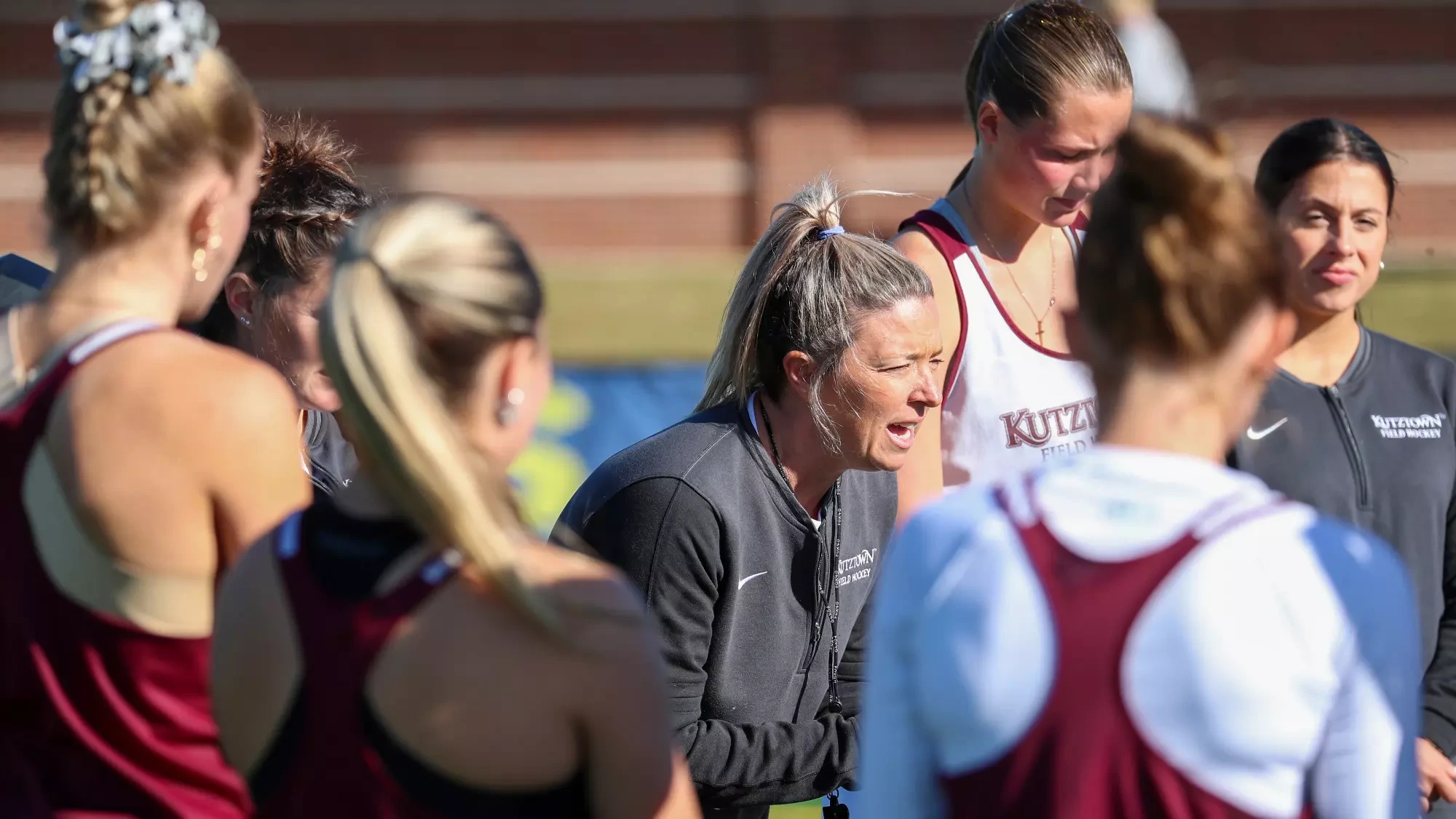 Head coach Marci Scheuing addresses the Golden Bears prior to Friday's NCAA semifinal against Shippensburg.