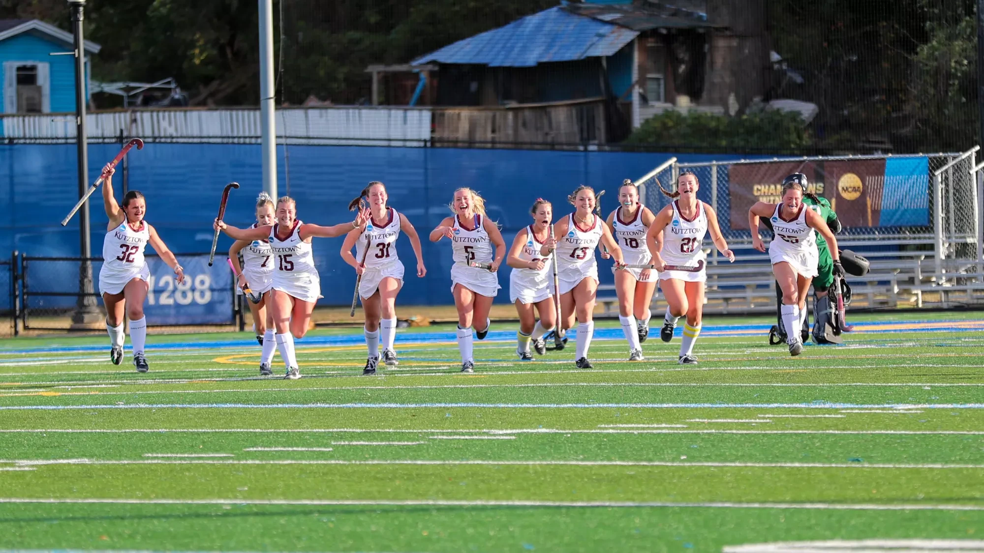Kutztown players celebrate a 4-3 win over Shippensburg in the NCAA semifinals on Friday, Nov. 22, 2024.