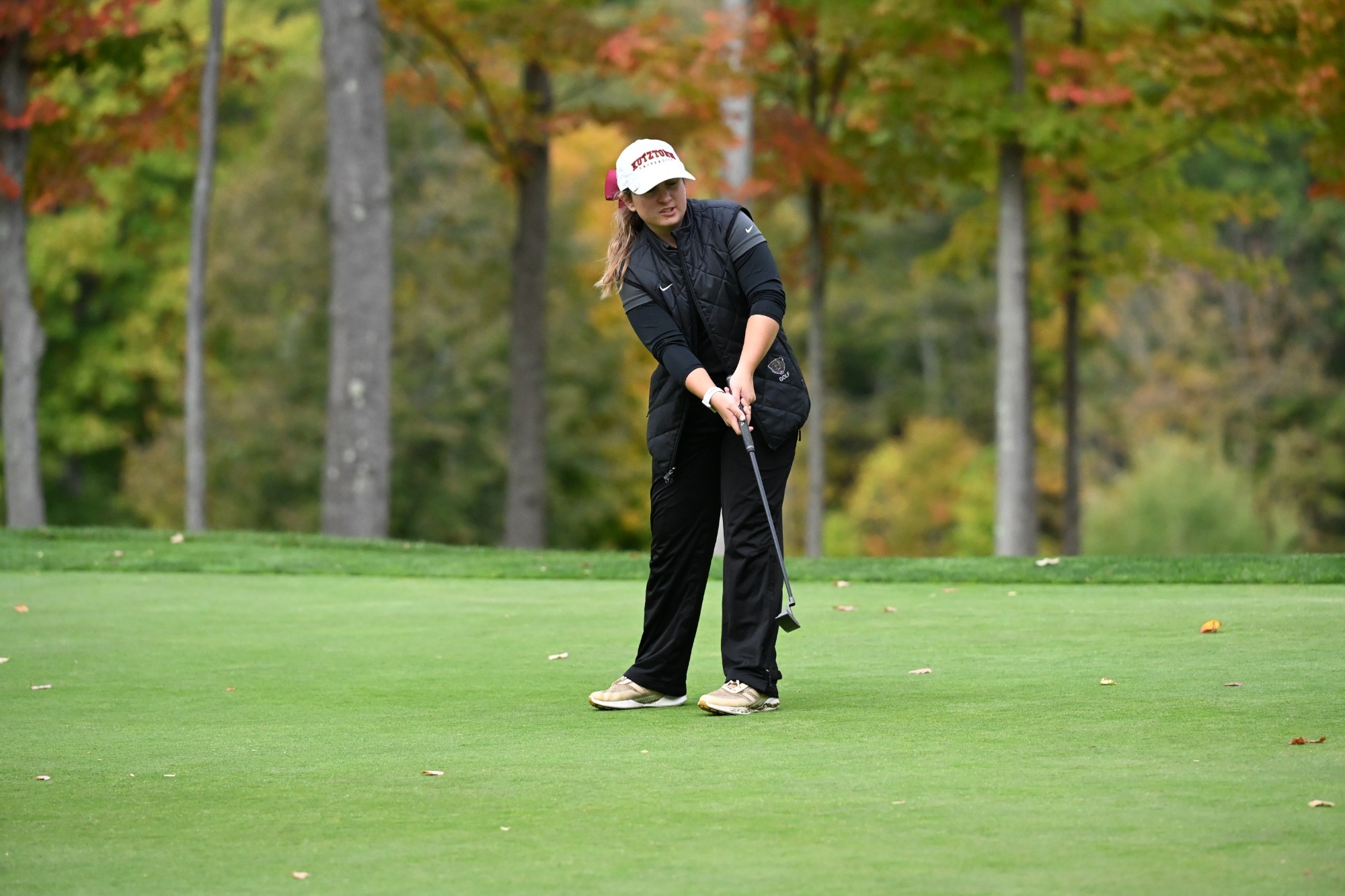 Grace Klements of the Kutztown University women's golf team putts during the opening round of the Michael Corbett Fall Classic on Sunday, Oct. 12, 2025.