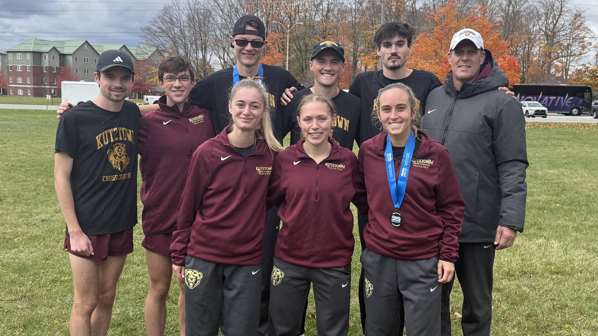 Kutztown University men's and women's cross country All-PSAC finishers from the PSAC Championships at Edinboro. Front row (L to R): Gabby Keith, Sophia Knerr, Maura Lenhart. Back row (L to R): Robby Lloyd, Peyton Small, Jack Hollar, Port Habalar, Adam Brocato, Head Coach Ray Hoffman.