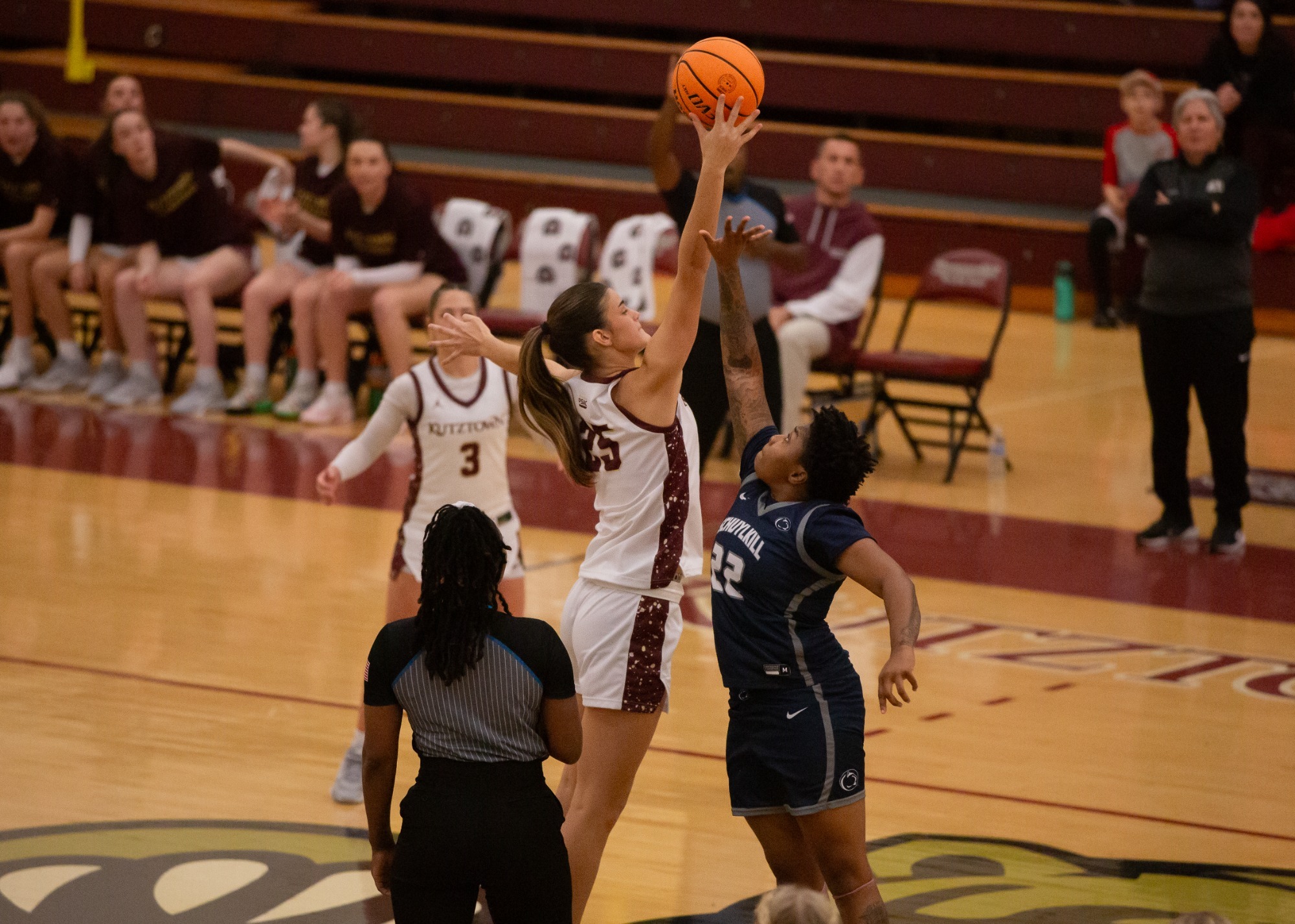 Ariana Smuda jumping for the ball vs. PSU Schuylkill, 11/19/25