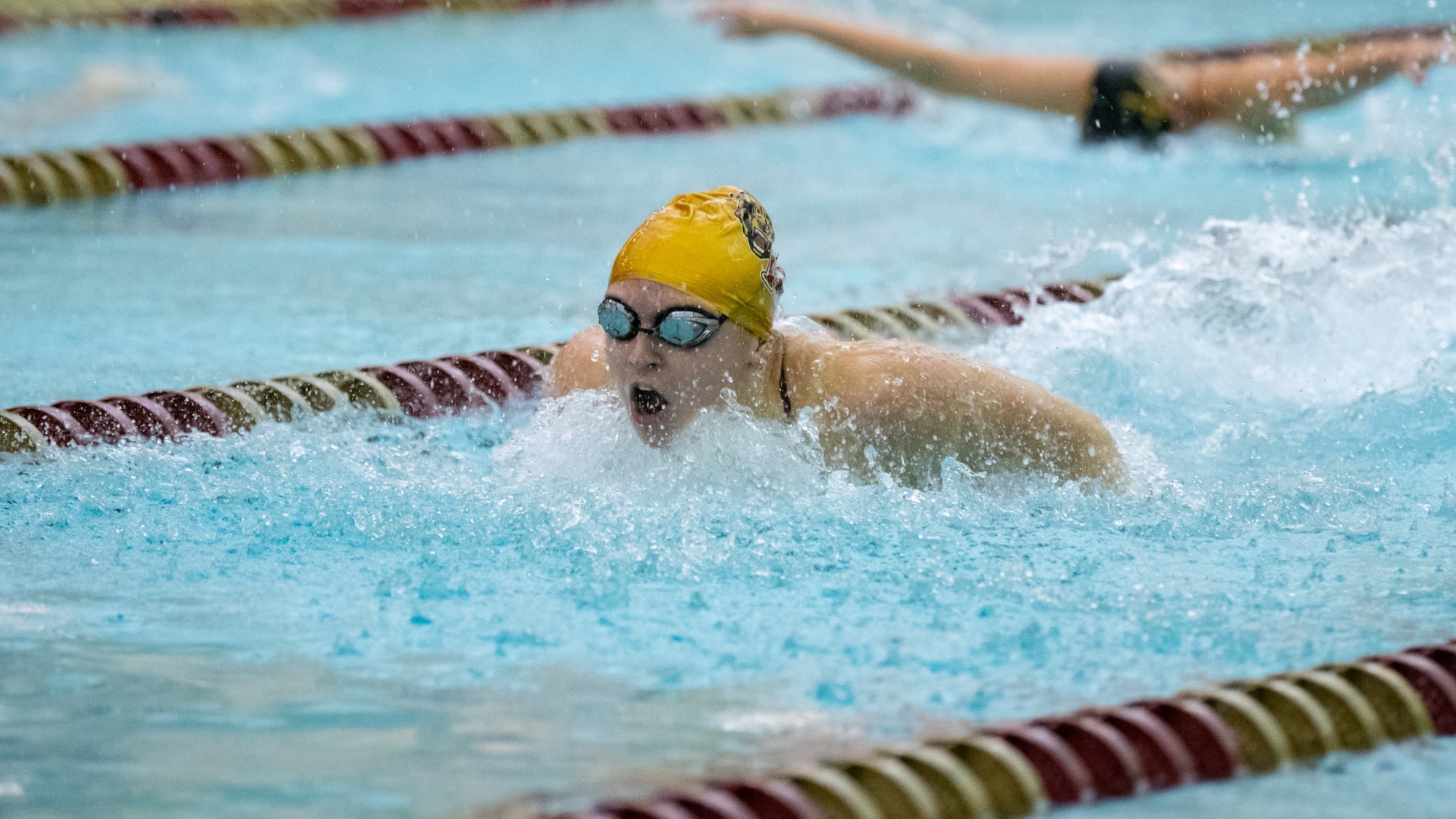 Sarah Zeminski of the Kutztown University women's swim team competes in the 100-yard butterfly against Millersville on Nov. 9, 2024.
