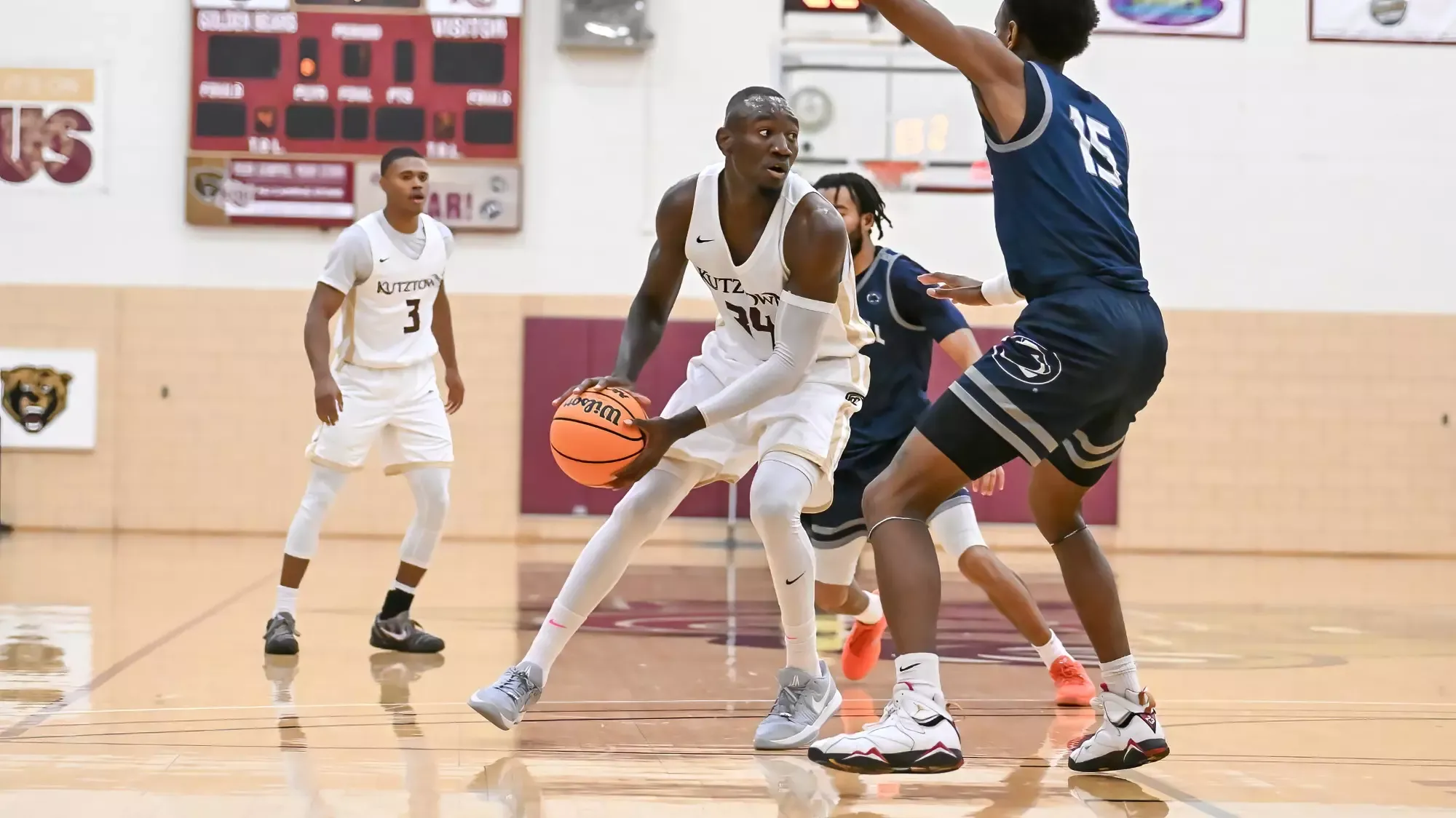 Jordan Nkoa Abessolo battling against a defender in Kutztown's win over Penn State Schuylkill 11-19-25
