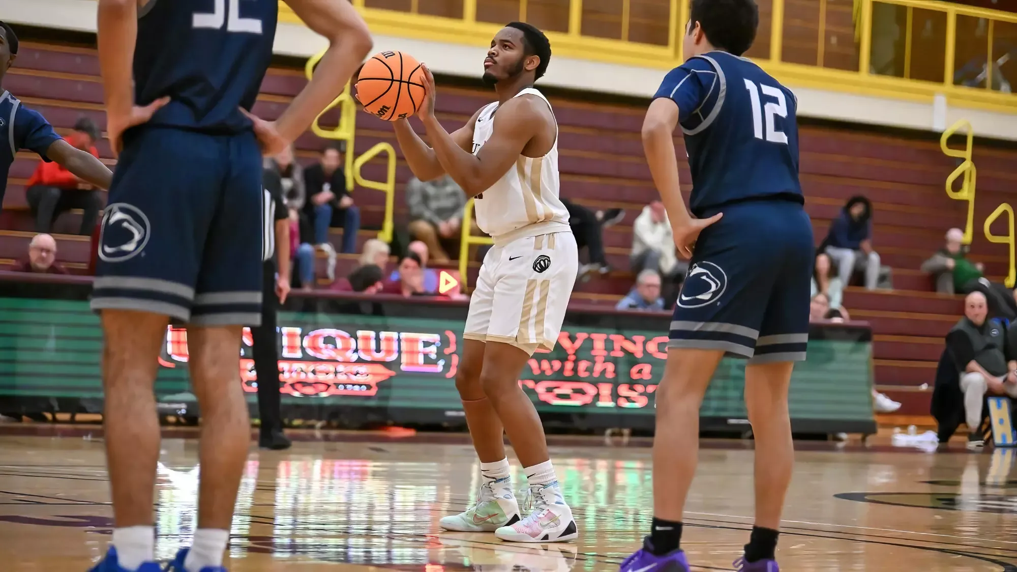 Yahmir Satterfield attempting a basket in Kutztown's win over Penn State Schuylkill 11-19-25