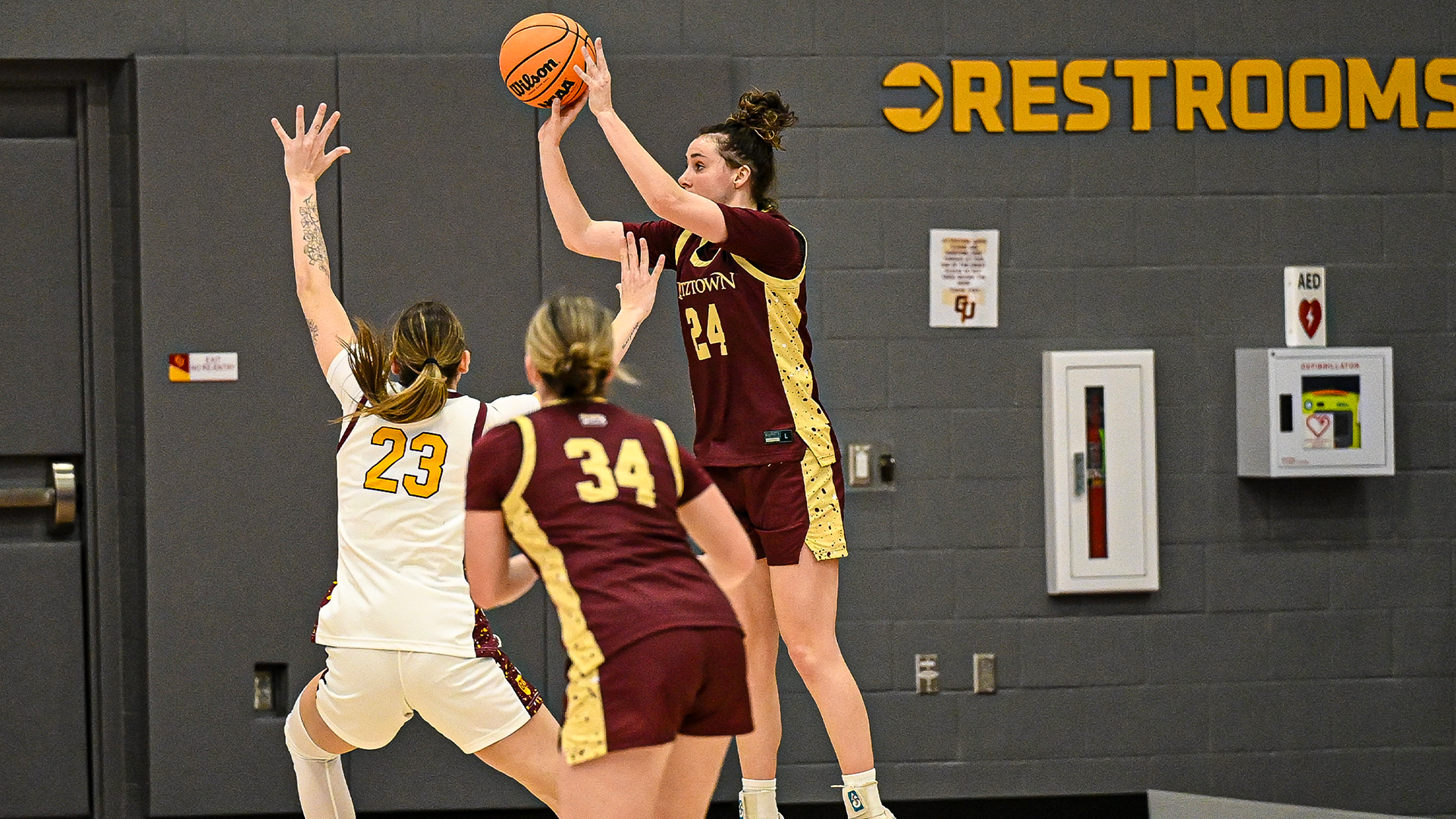Madison Siggins of the Kutztown University women's basketball team attempts a 3-point shot during the Golden Bears' PSAC crossover game at No. 5 Gannon on Tuesday, Dec. 16, 2025.