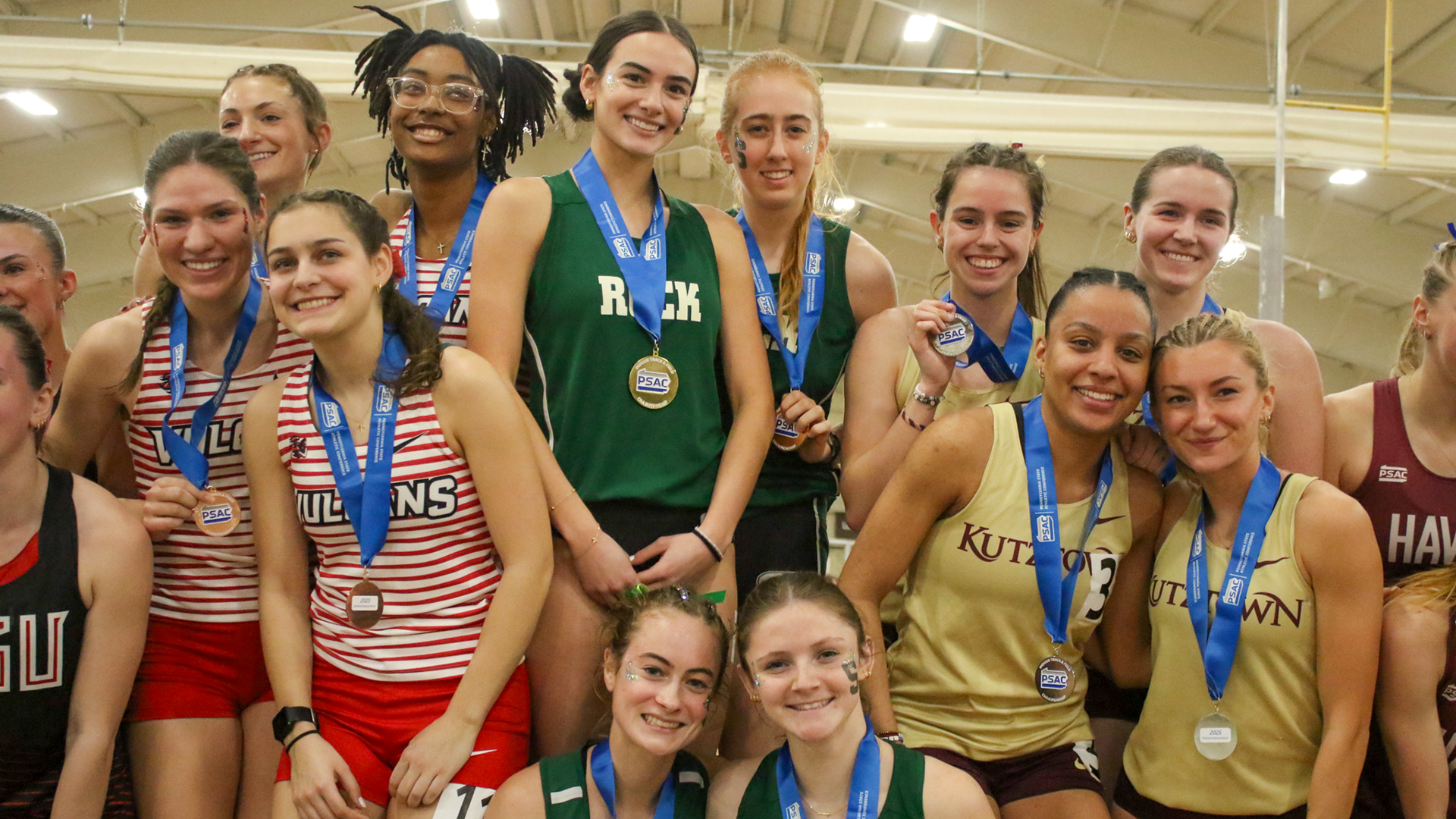 Kutztown's Distance Medley Relay team of Mackey Donovan, Beth Schearer, Jensen Kraft and Deandra Young pose on the podium after winning the silver medal at the PSAC Indoor Championships on Saturday, March 1, 2025.