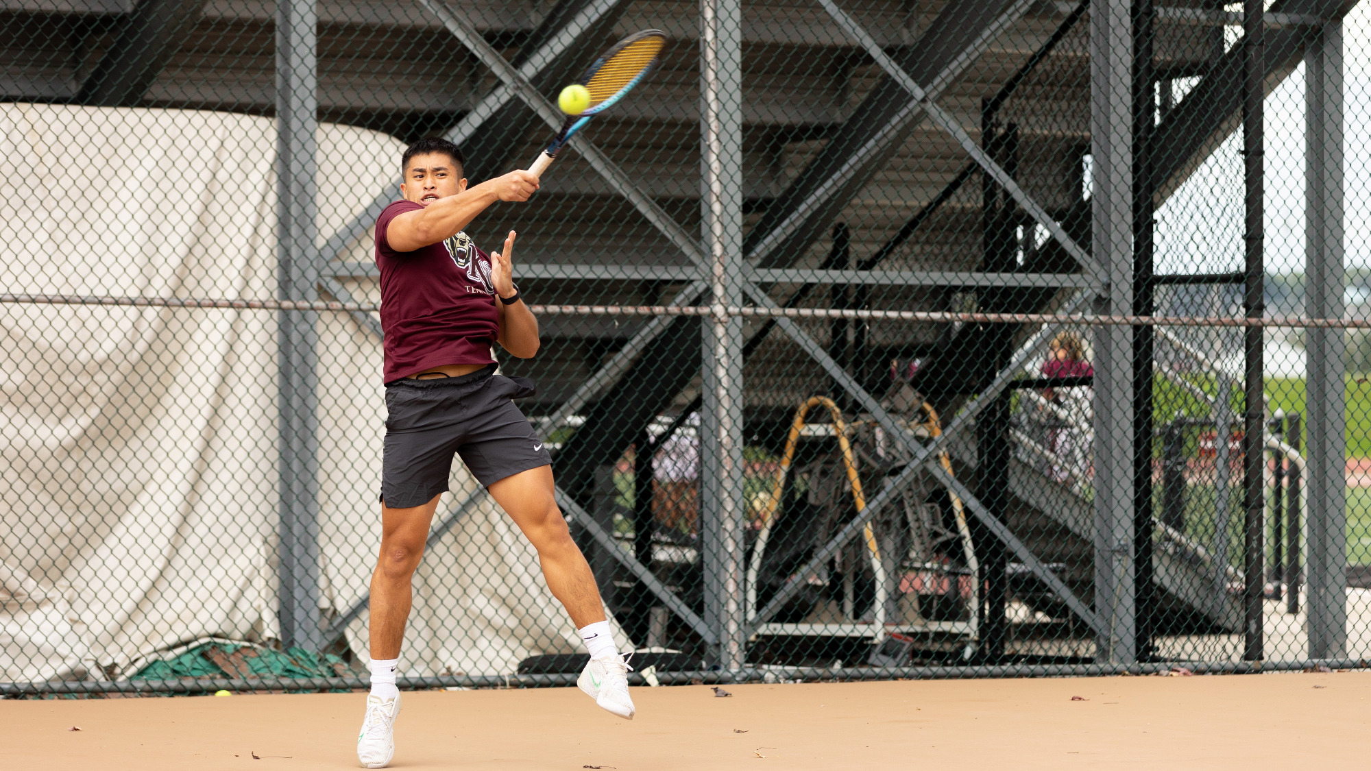 Terrell Arejola of the Kutztown University men's tennis team hits a forehand shot during a practice session at the Keystone Courts on Oct. 1, 2024.