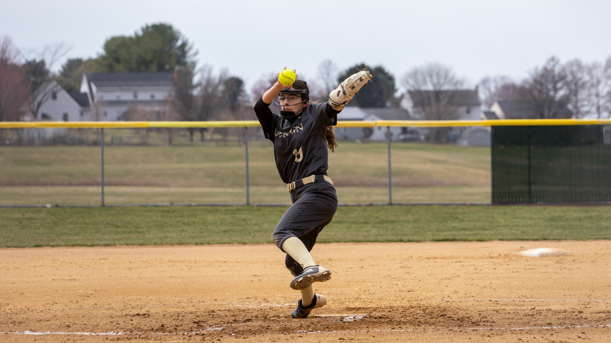 Abbey Wagner throwing a pitch vs. Bloomsburg, 3/28/25