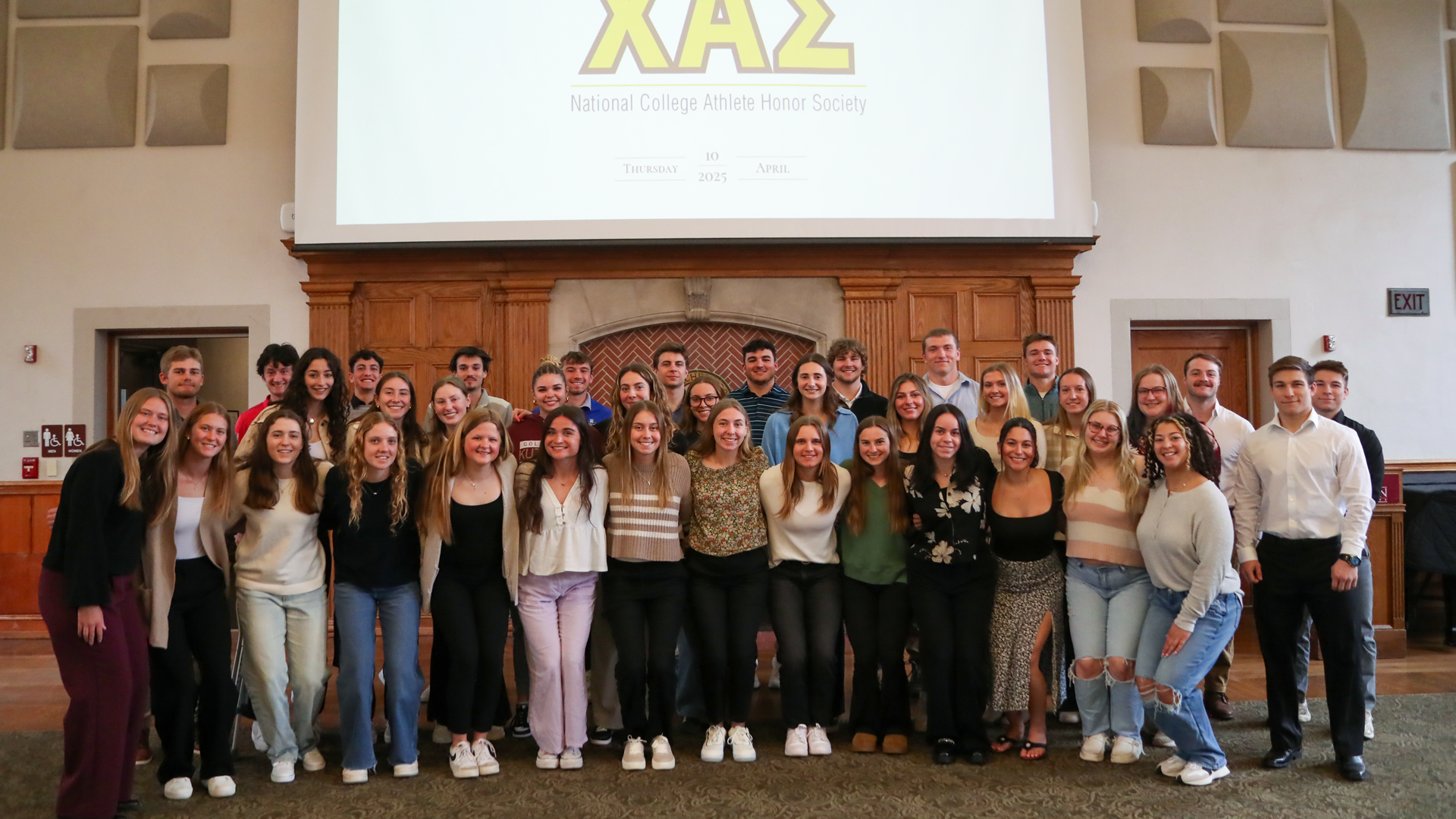 The 40 Kutztown Chi Alpha Sigma inductees posing for a photo in the Georgian Room, 4/10/25