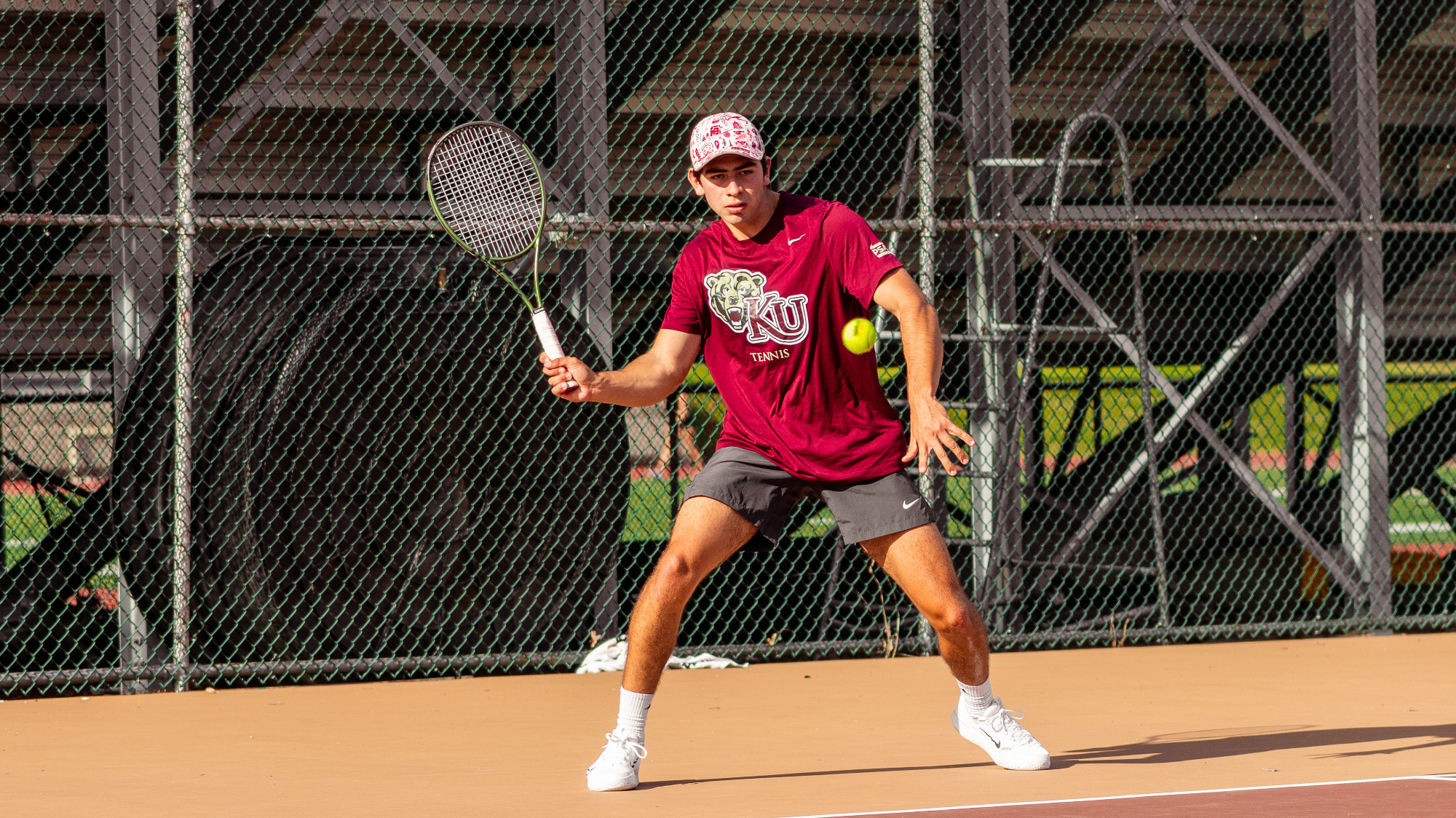 Joaquin Perez of the Kutztown University men's tennis team readies to return a shot in a non-conference match against Jefferson on Oct. 8, 2024.