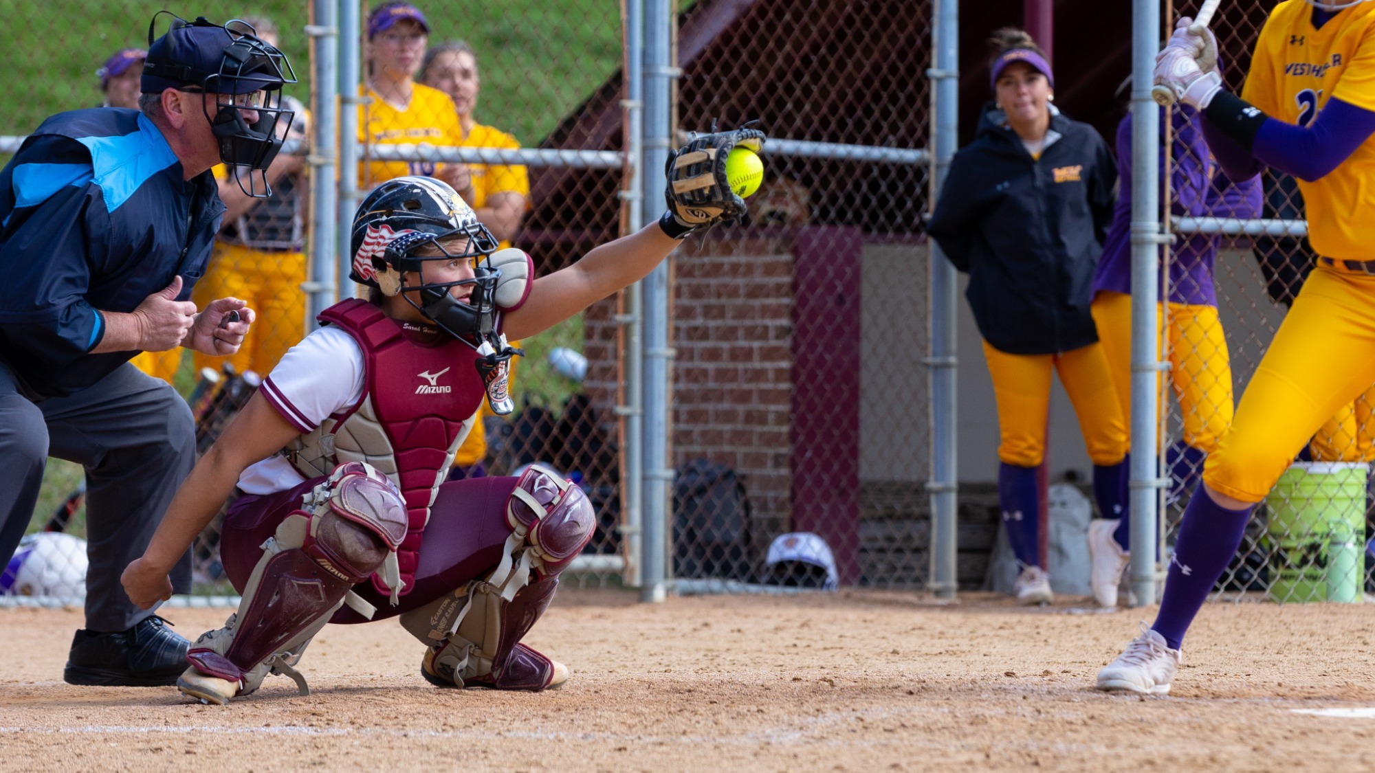 Sarah Harvat catching a pitch vs. West Chester, 4/15/25