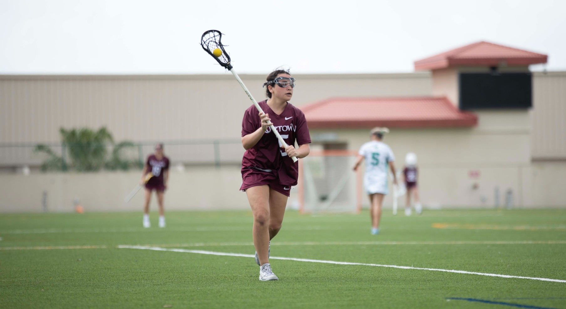 Gabriella Mina carries the ball down the field vs. #8 Saint Leo during Florida Spring Break trip 2025