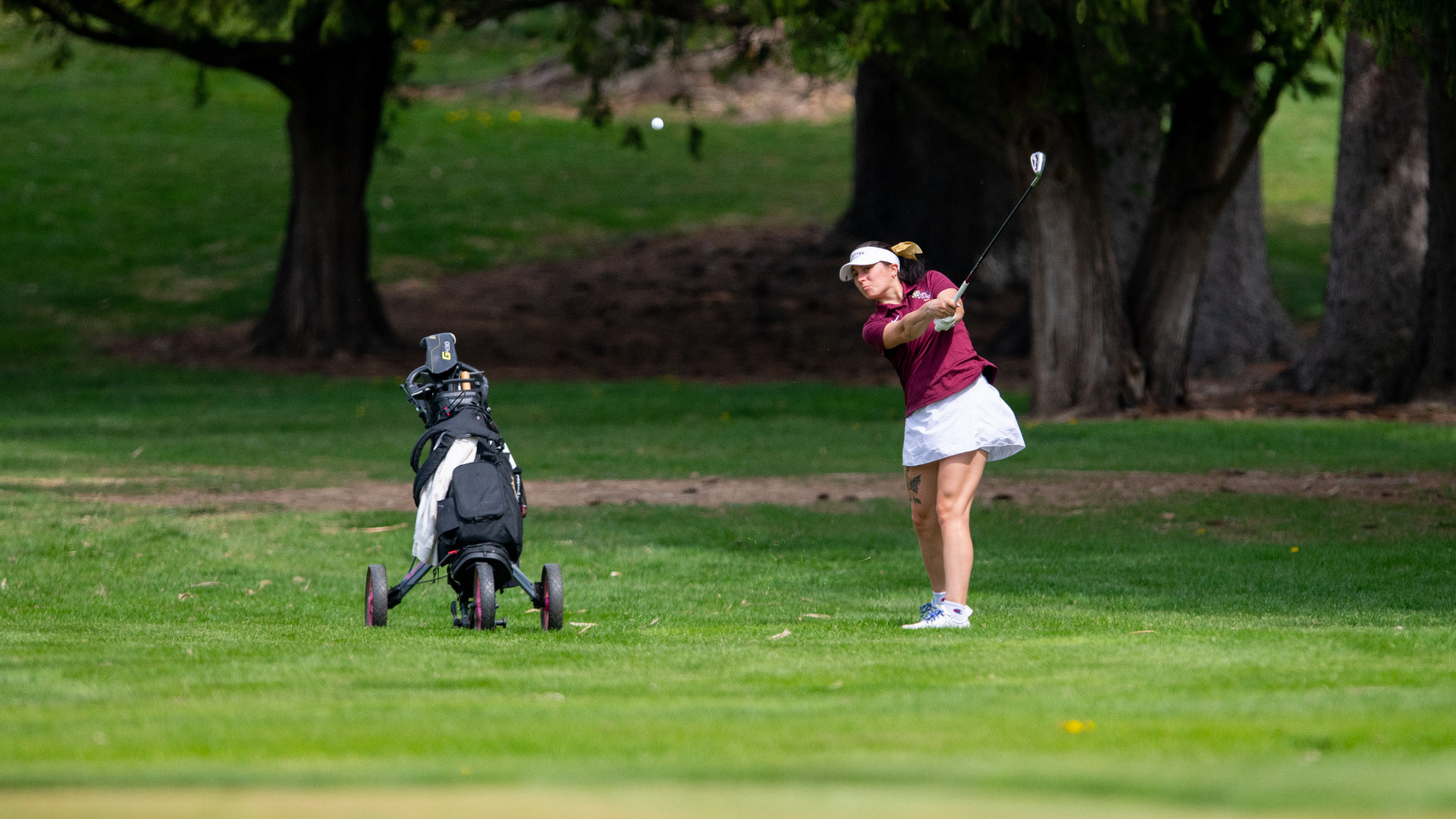 Gabby Cohen of the Kutztown University women's golf team takes a shot during the 2025 PSAC Championship at Berkleigh Golf Club on Friday, April 25.