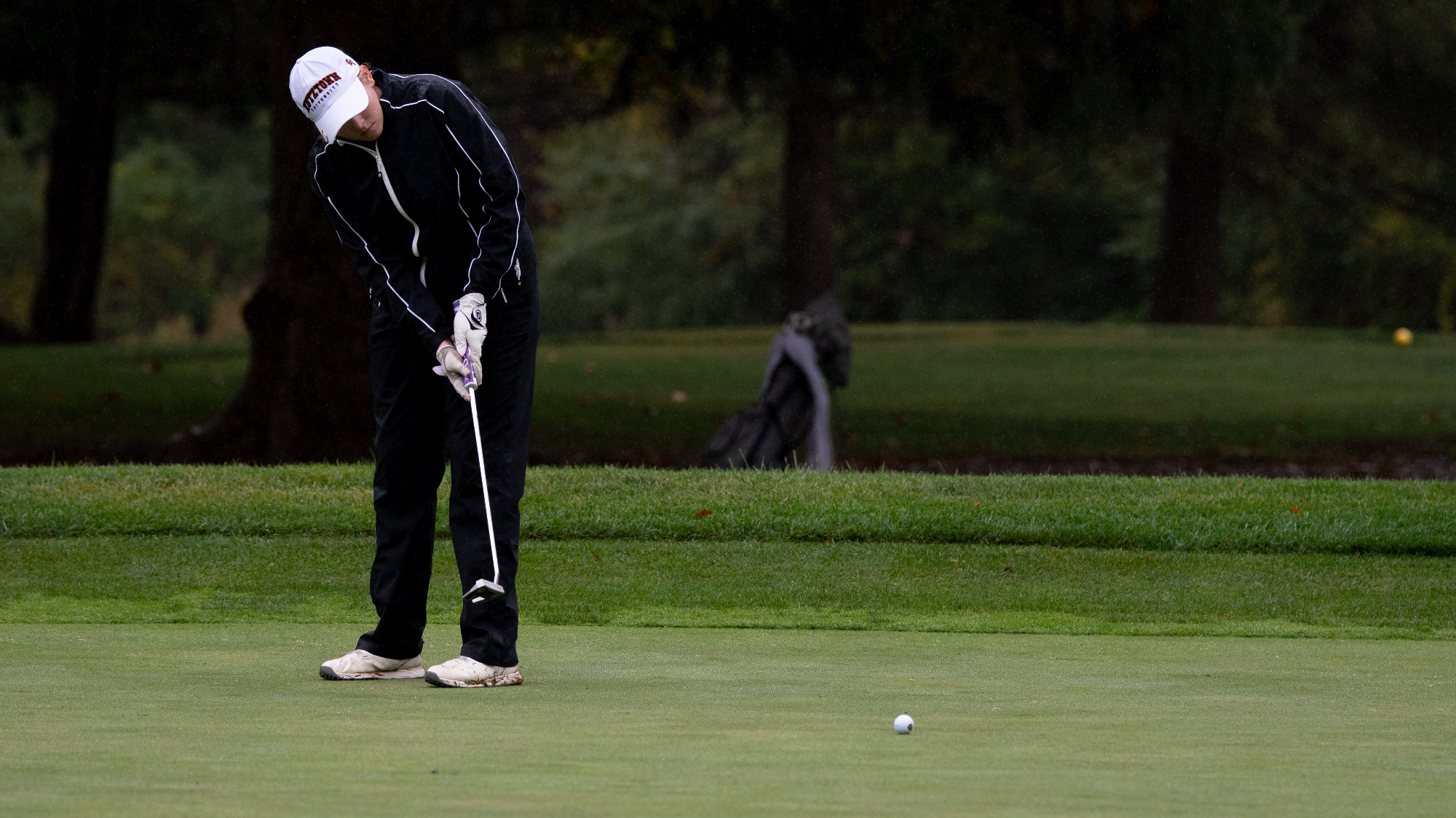 Rhi Stutz of the Kutztown University women's golf team putts during the Millersville Fall Classic on Sept. 23, 2024.