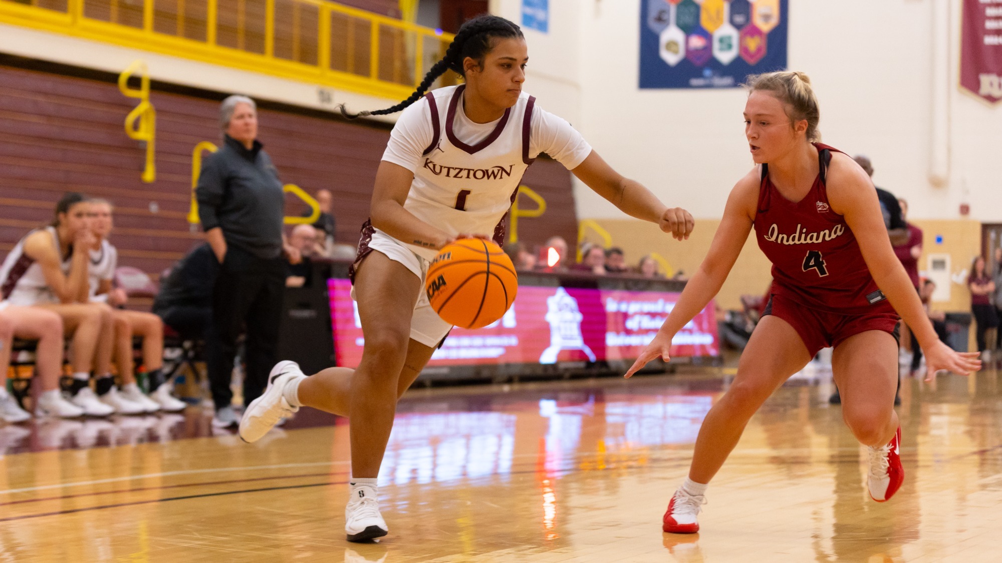 Danae Ellzy of the Kutztown University women's basketball team drives in a game against IUP on Friday, Dec. 5, 2025.