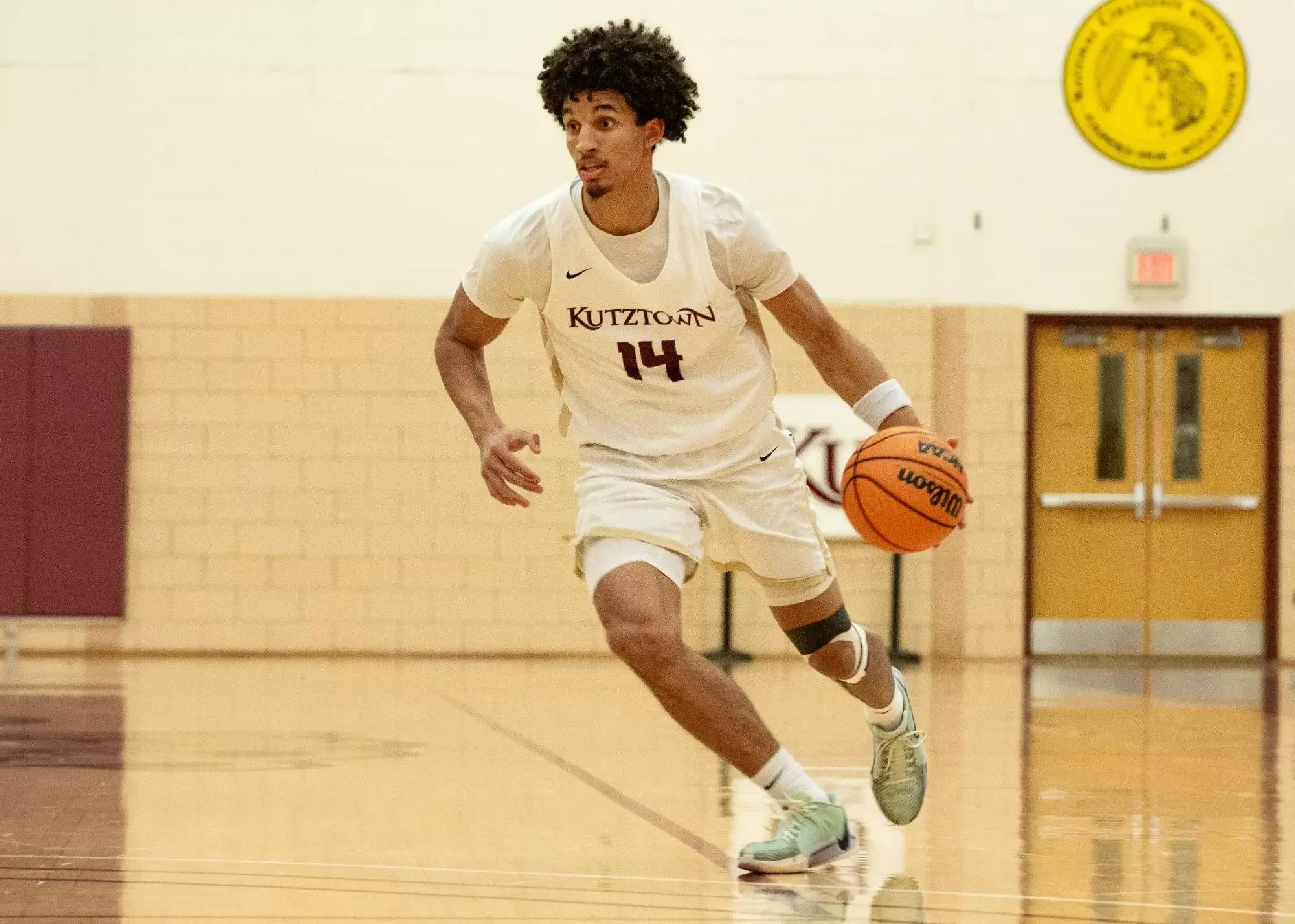 Josh McKoy driving down the lane against Frostburg State 12-1-25