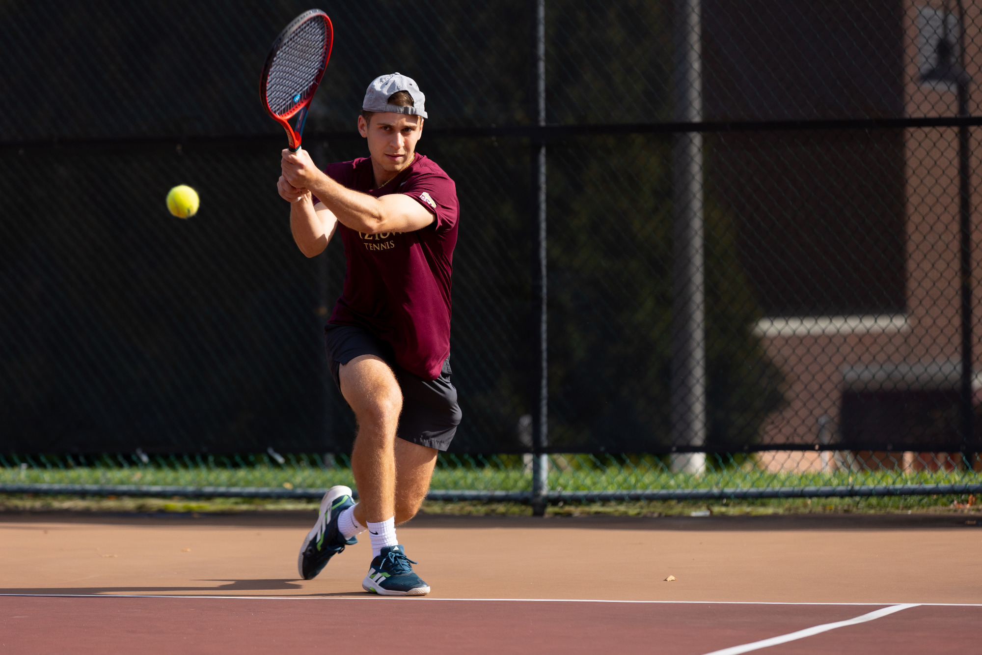 Luis Lopes of the Kutztown University men's tennis team hits a backhand shot during a practice session at the Keystone Courts on Oct. 8, 2025.