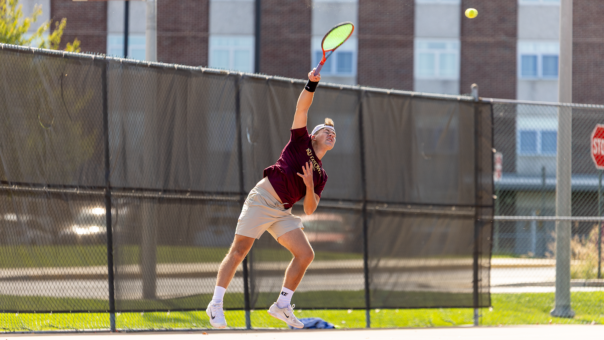 Patrick Young of the Kutztown University men's tennis team serves during a match against Davis & Elkins on Saturday, Oct. 3, 2026.