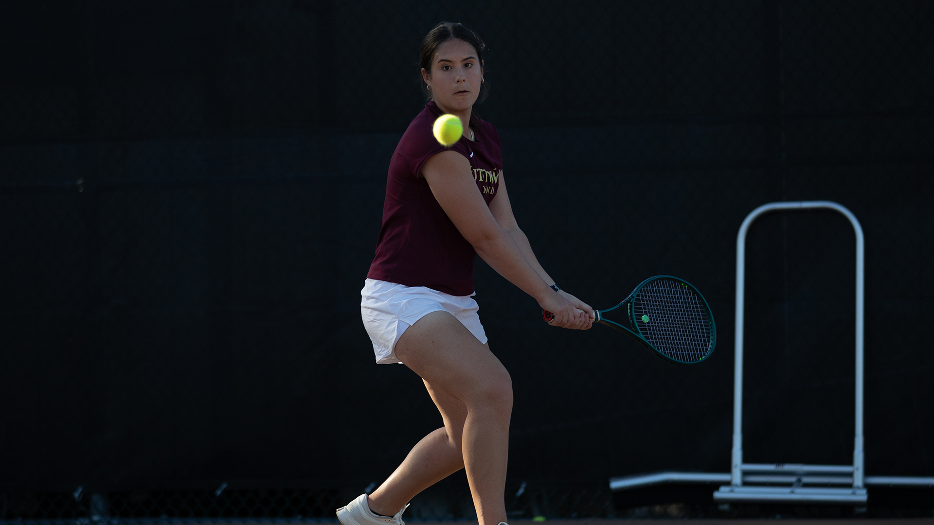 Isabela de Nadai of the Kutztown University women's tennis team hits a backhand shot during a match against Scranton on Monday, Sept. 14, 2026.