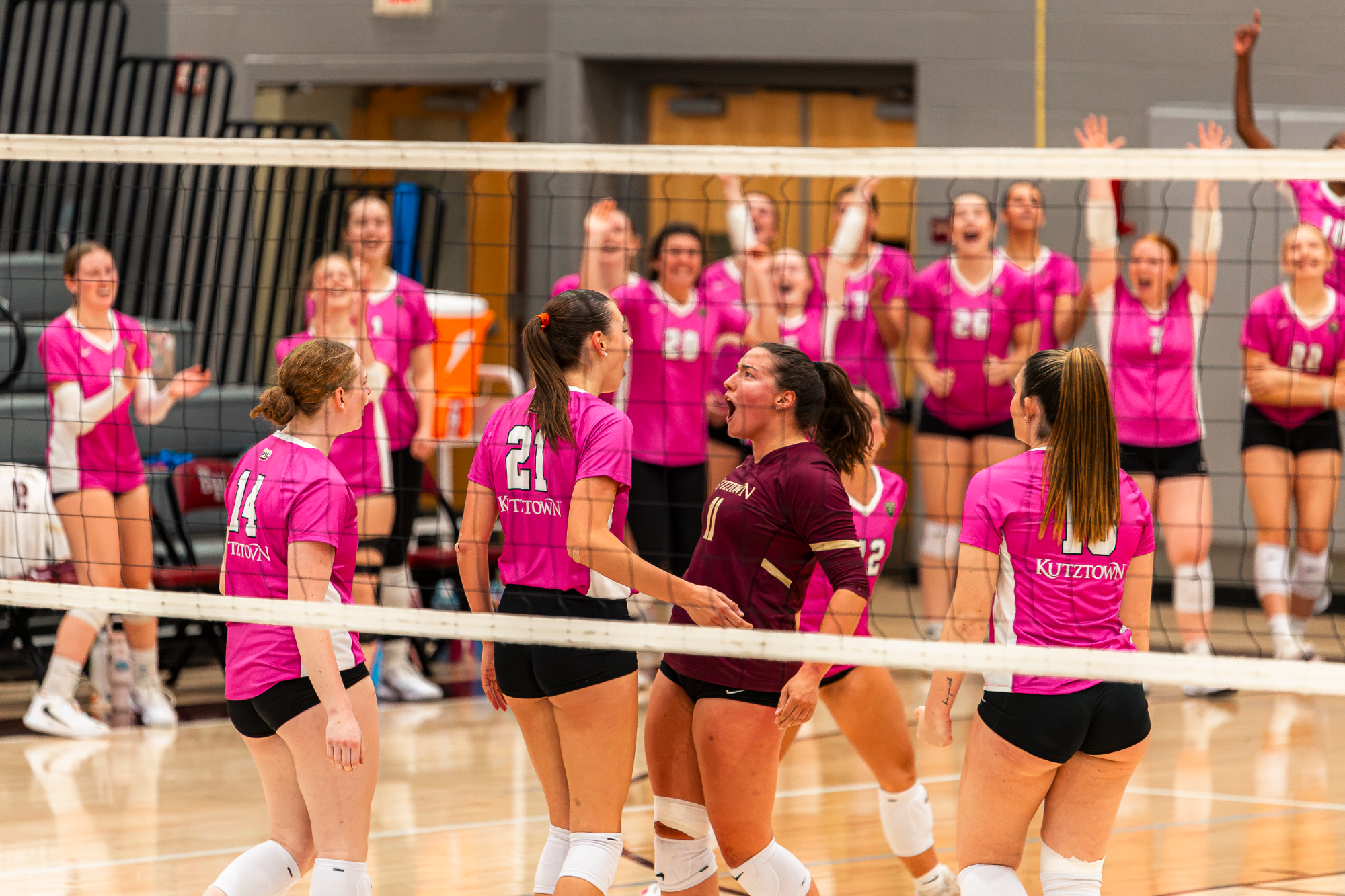 Kutztown women's volleyball celebrating a point vs. Lock Haven, 10/23/26