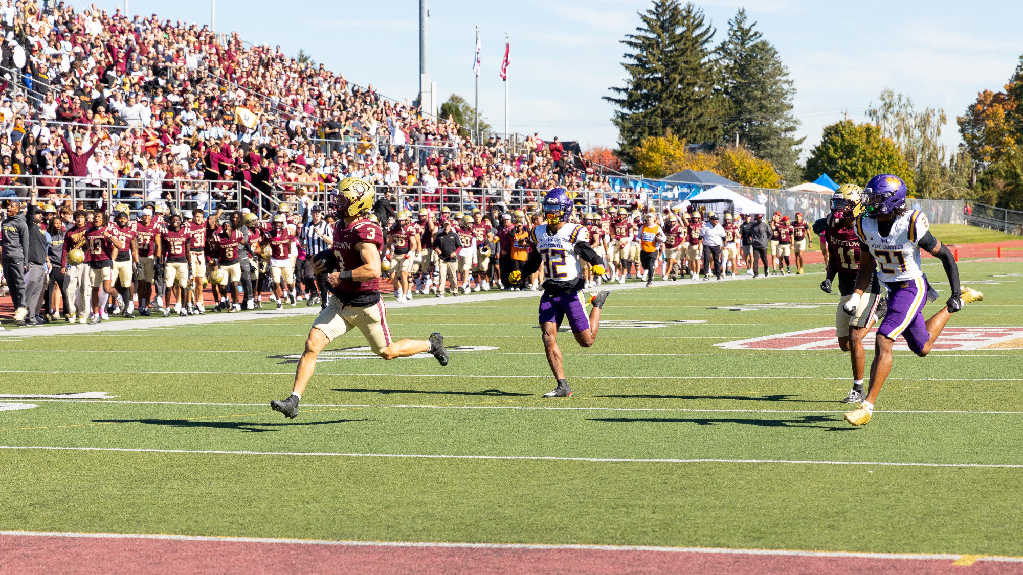 Judd Novak (3) of the Kutztown University football team scores on a 70-yard run during the first quarter of the Golden Bears' 41-14 Homecoming win over West Chester at Andre Reed Stadium on Saturday, Oct. 24, 2026.