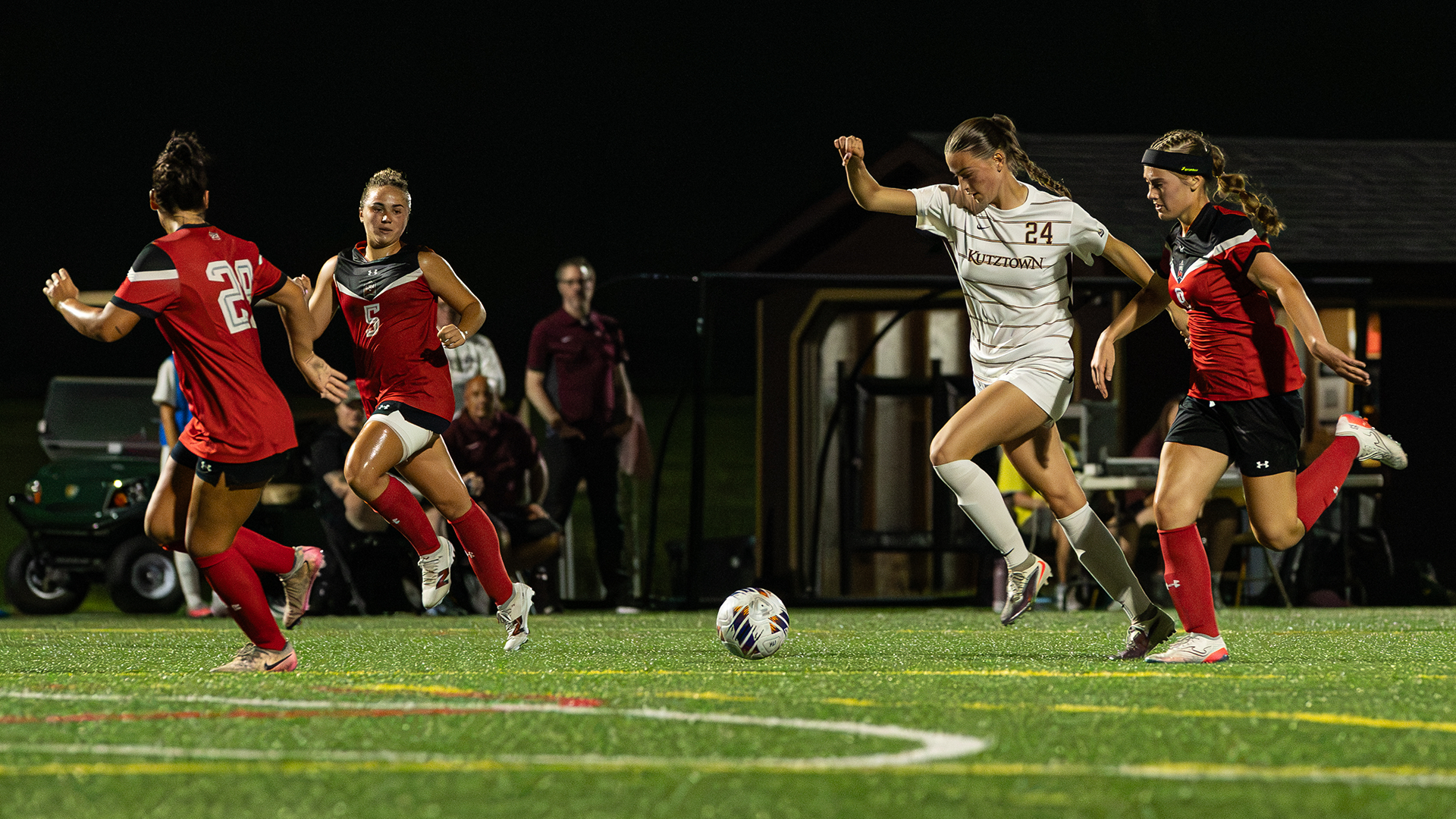 Carly Louey of the Kutztown University women's soccer team looks to fend off defenders in a PSAC East game against East Stroudsburg on Wednesday, Sept. 9, 2026.