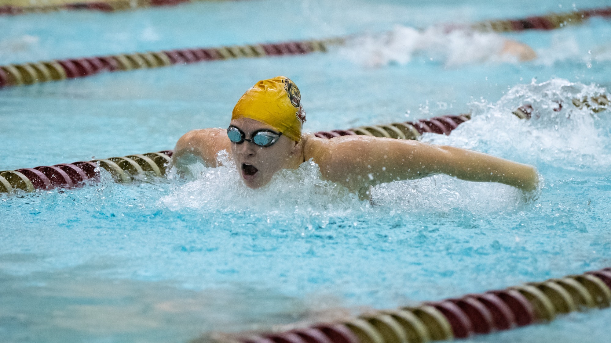 Sarah Zeminski of the Kutztown University women's swim team competes in the 100-yard butterfly during a meet against Millersville on Nov. 9, 2024.