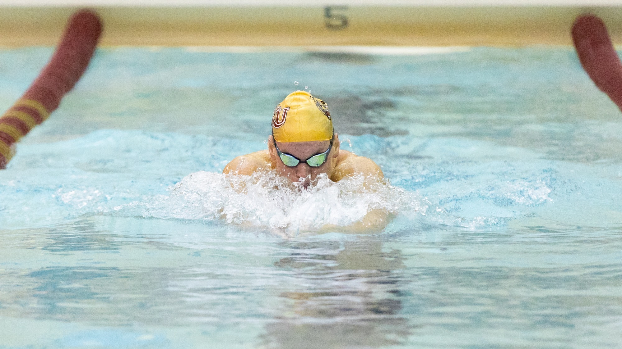 Nevin Shaw of the Kutztown University men's swim team competes in the breaststroke leg of the 200 IM during a tri-meet against Bloomsburg and Edinboro on Saturday, Nov. 1, 2025.