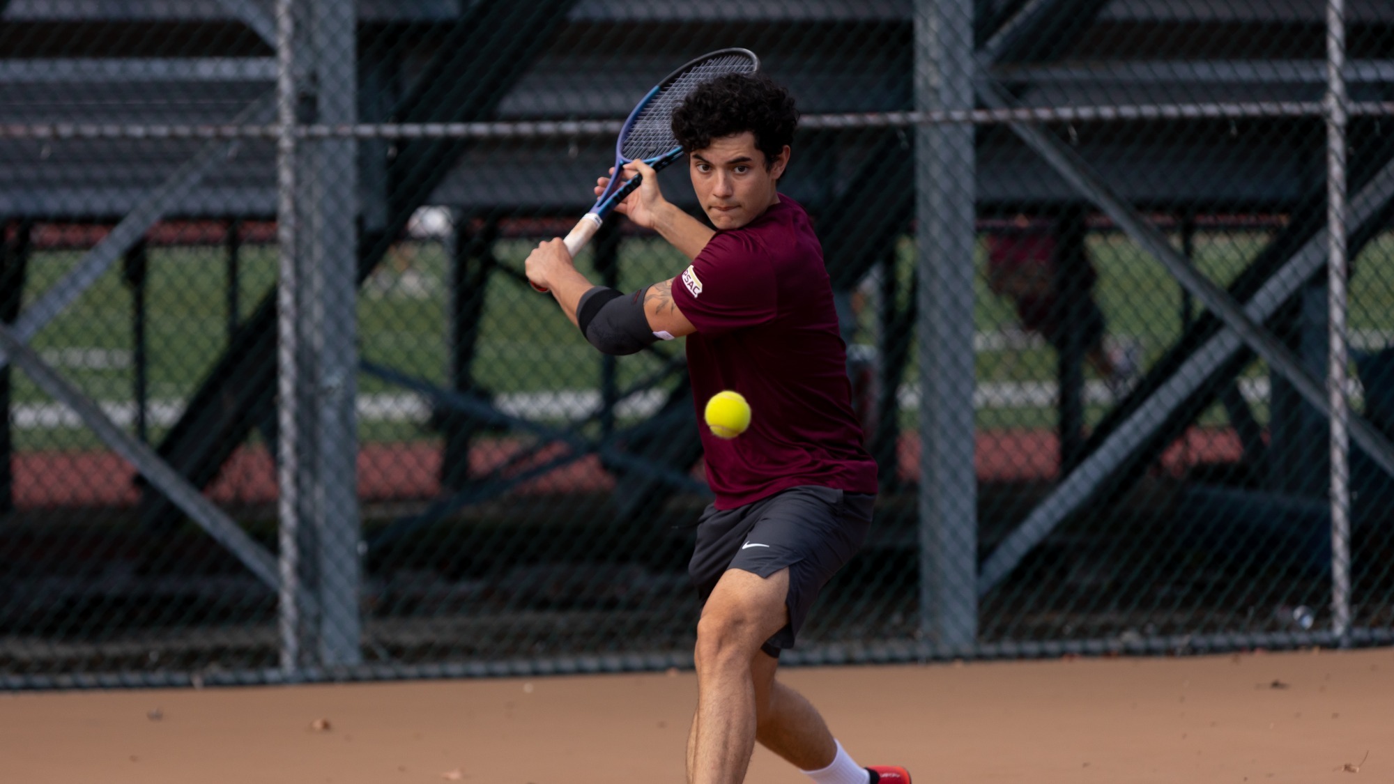 Raphael Hoareau Lebon of the Kutztown University men's tennis team hits a backhand shot during a practice session on Oct. 8, 2025.