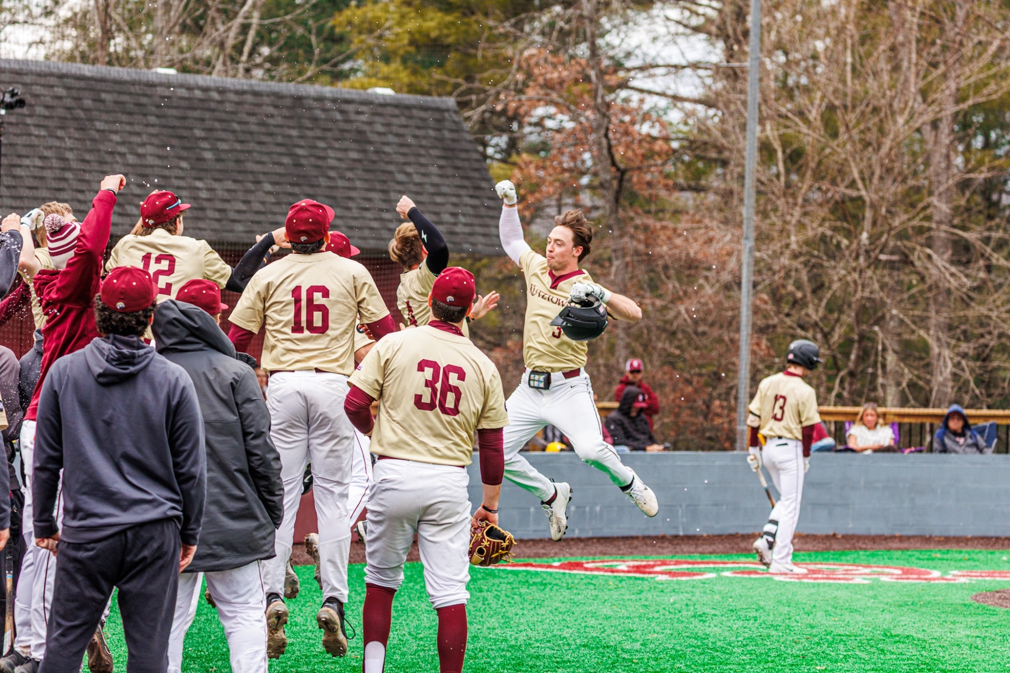 Kutztown celebrating a home run in a win over Concord (W. Va.) 030126
