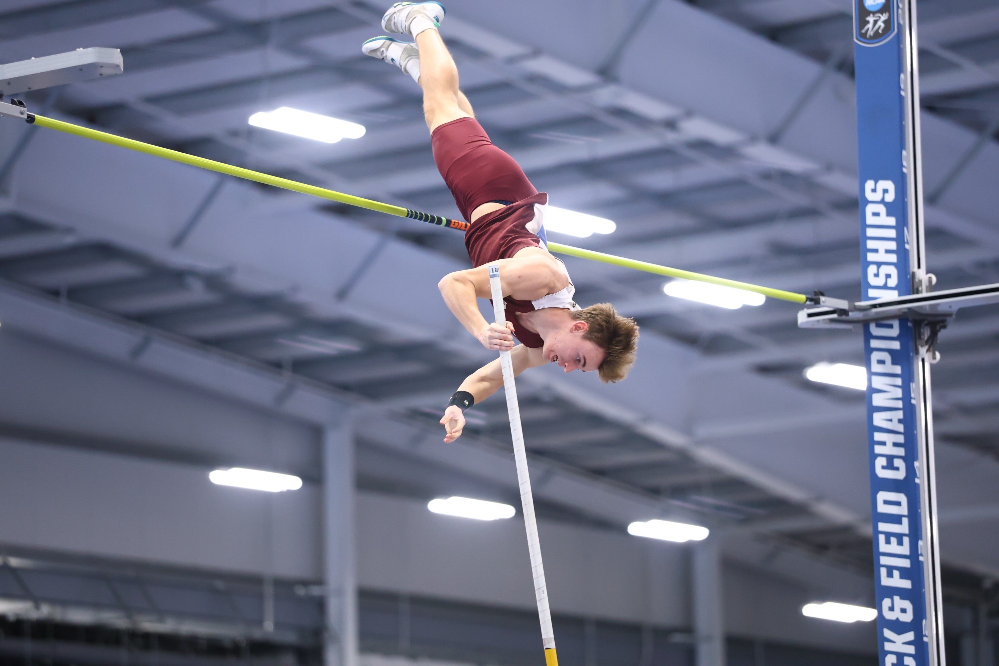 Andrew Szeplaki clearning the pole in the pole vault at NCAA Division II Indoor Championships, 3/13/26