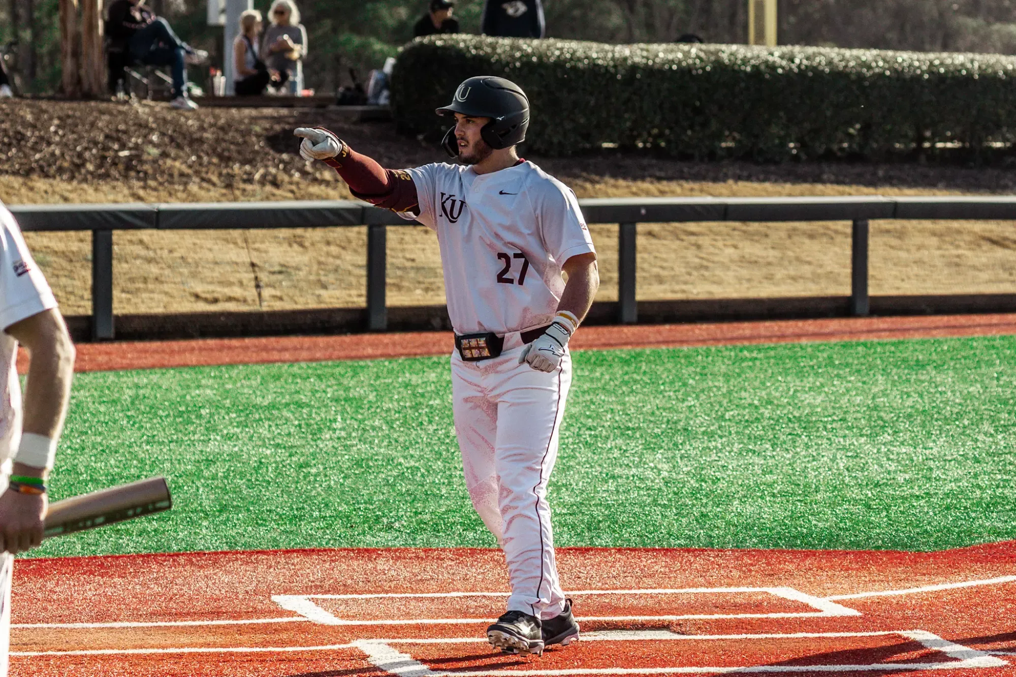 Joel Bonner crossing the plate against Slippery Rock 022026