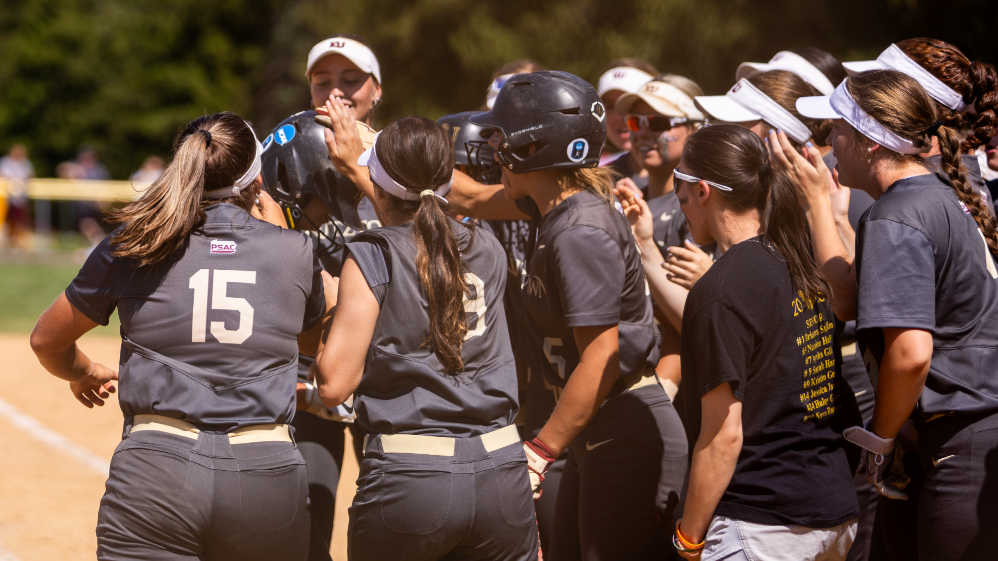 Kutztown softball celebrating a home run vs. Bloomsburg, 5/11/25