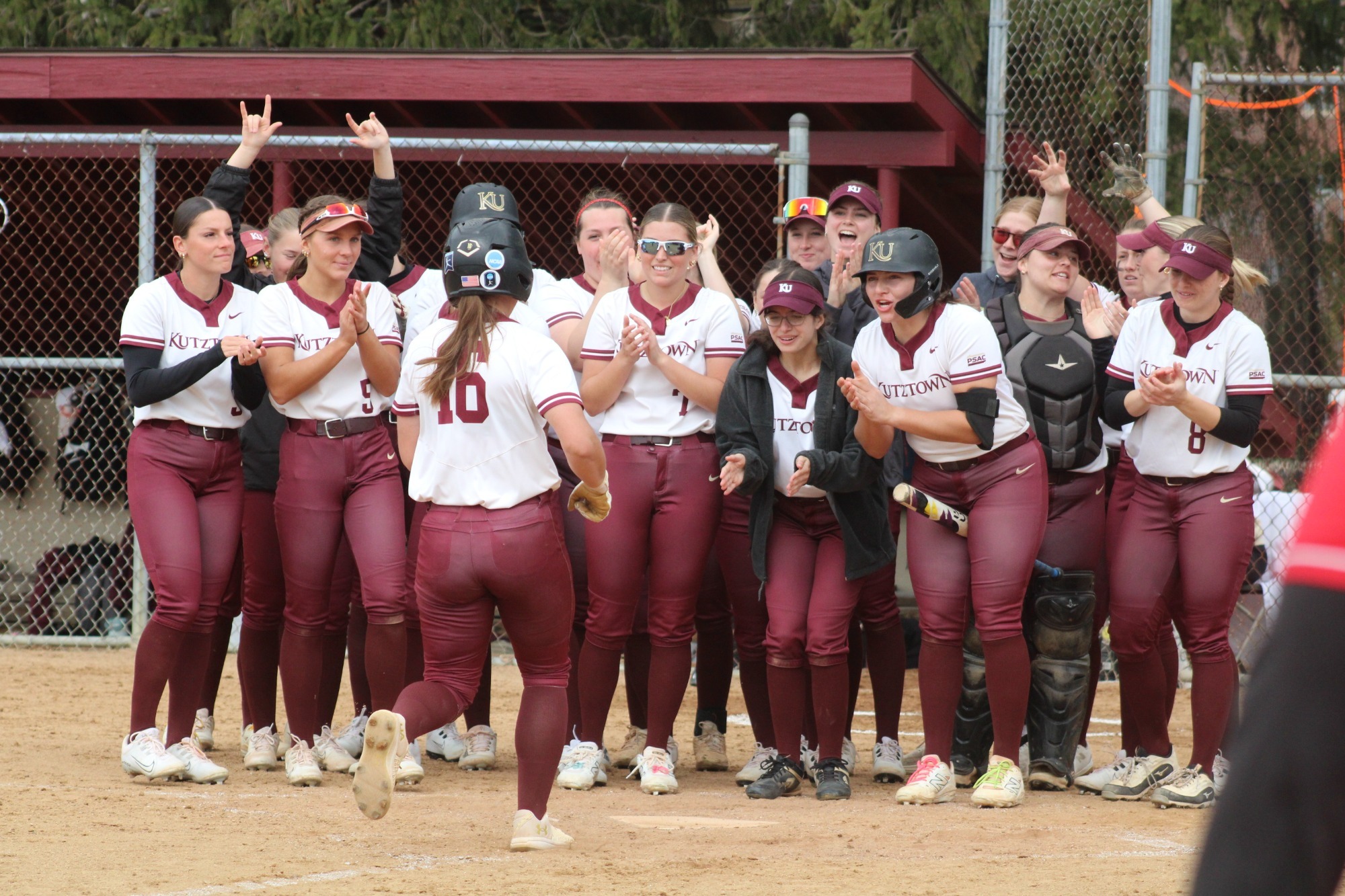 Kutztown celebrating a home run vs. Mansfield, 3/20/26