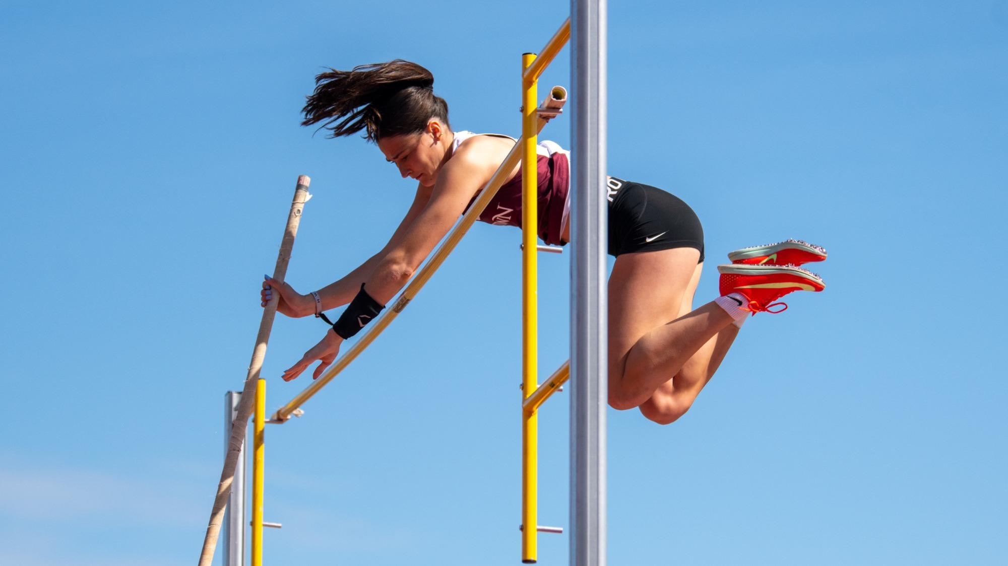 Taylor Funk clearing the bar in the pole vault at the Keystone Challenge, 3/21/26