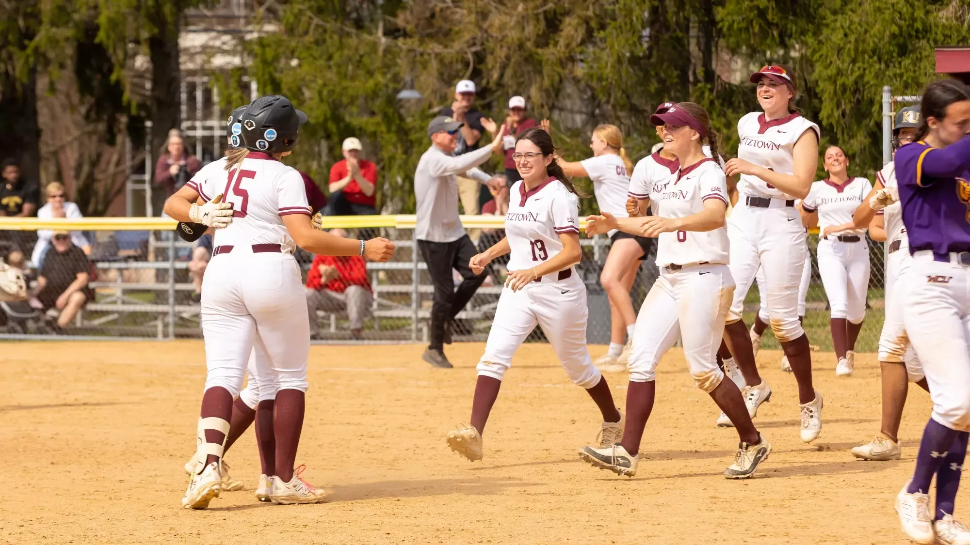 KU softball celebrating against West Chester 033126