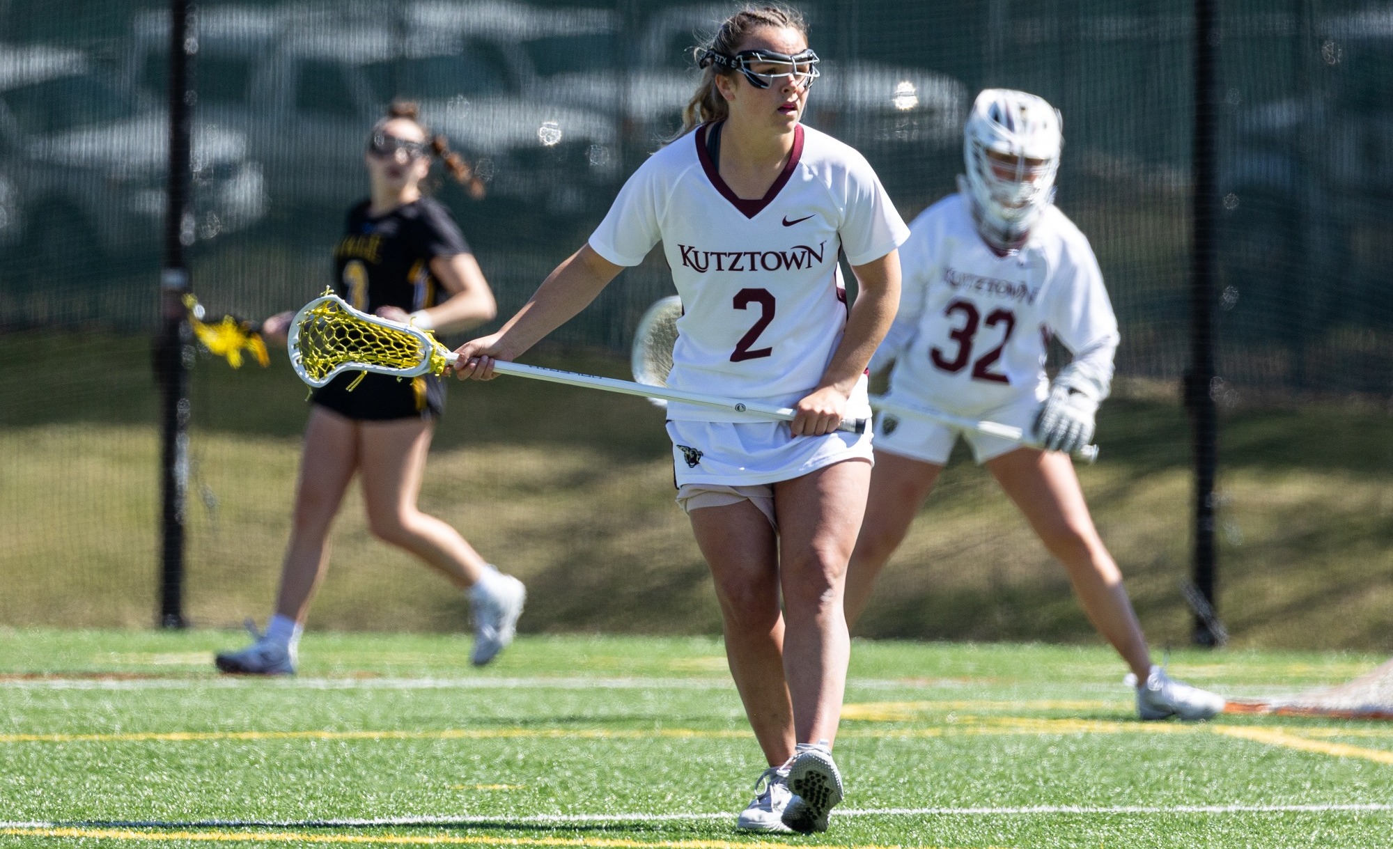 Kutztown Women's Lacrosse's Summer Davis looks upfield 2026
