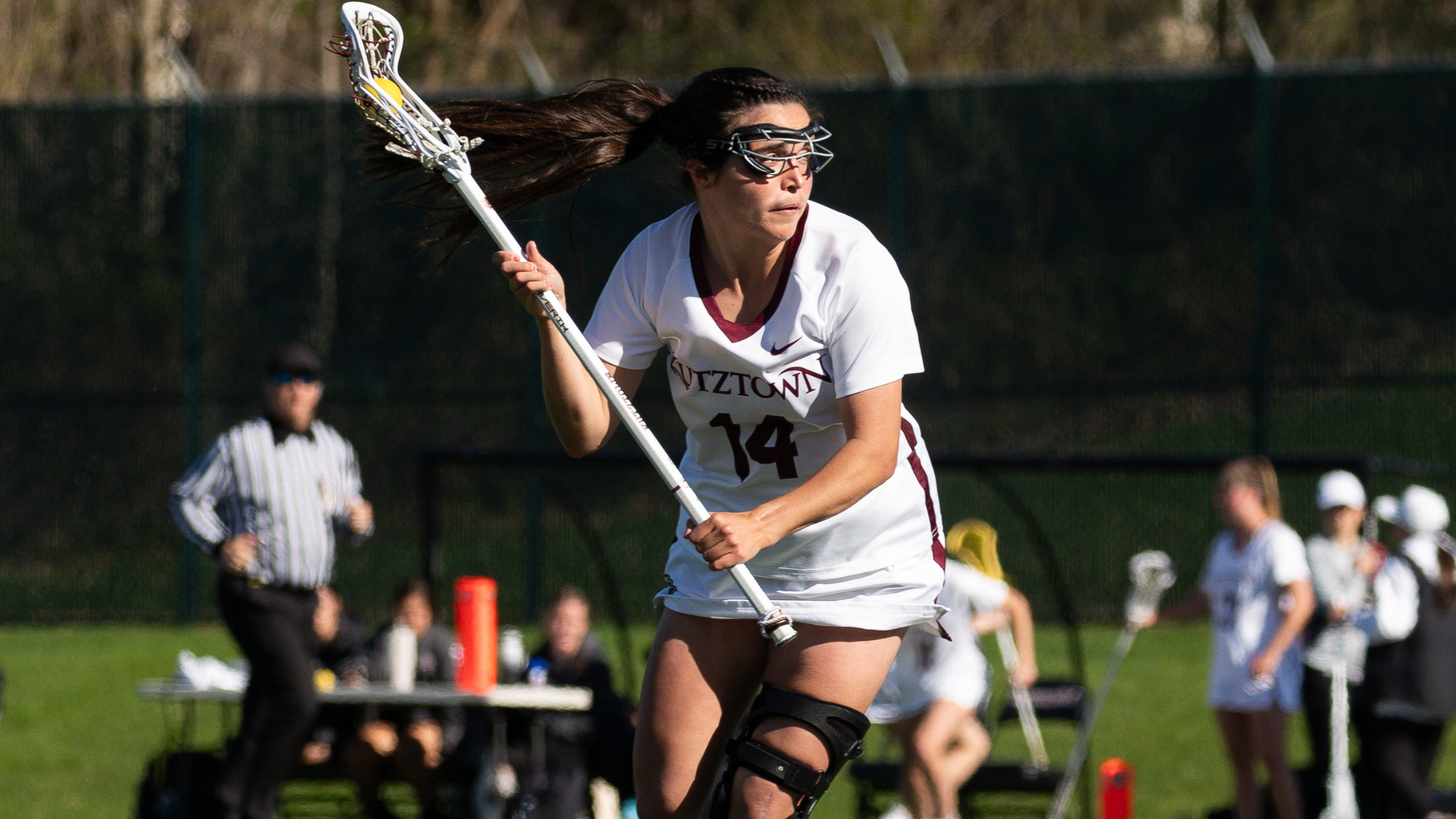 Katie Youcm looks to pass the ball at home vs. No. 11 West Chester 2026