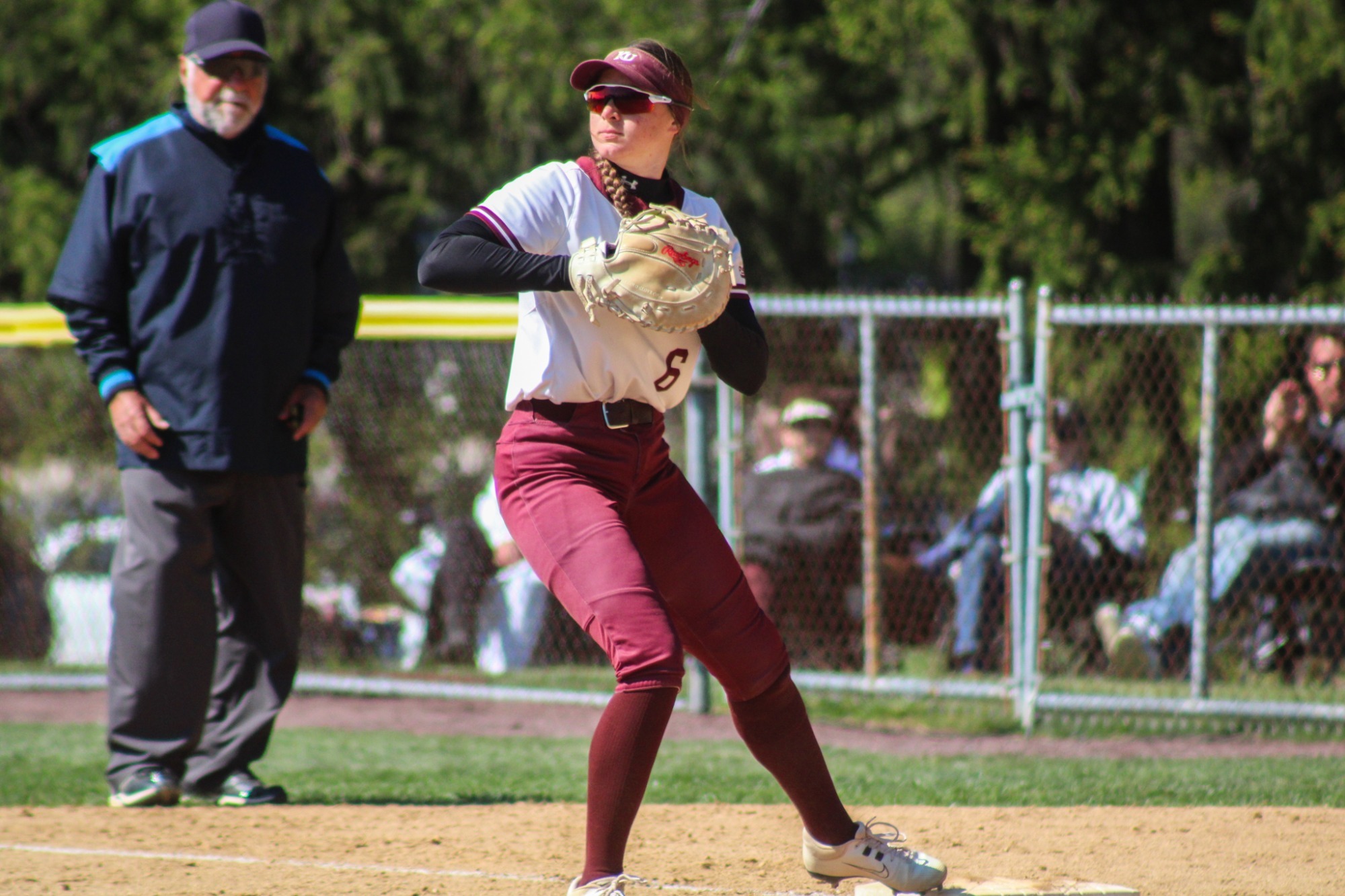 Ashley Schulz looking to make a throw at first base vs. East Stroudsburg, 4/21/26